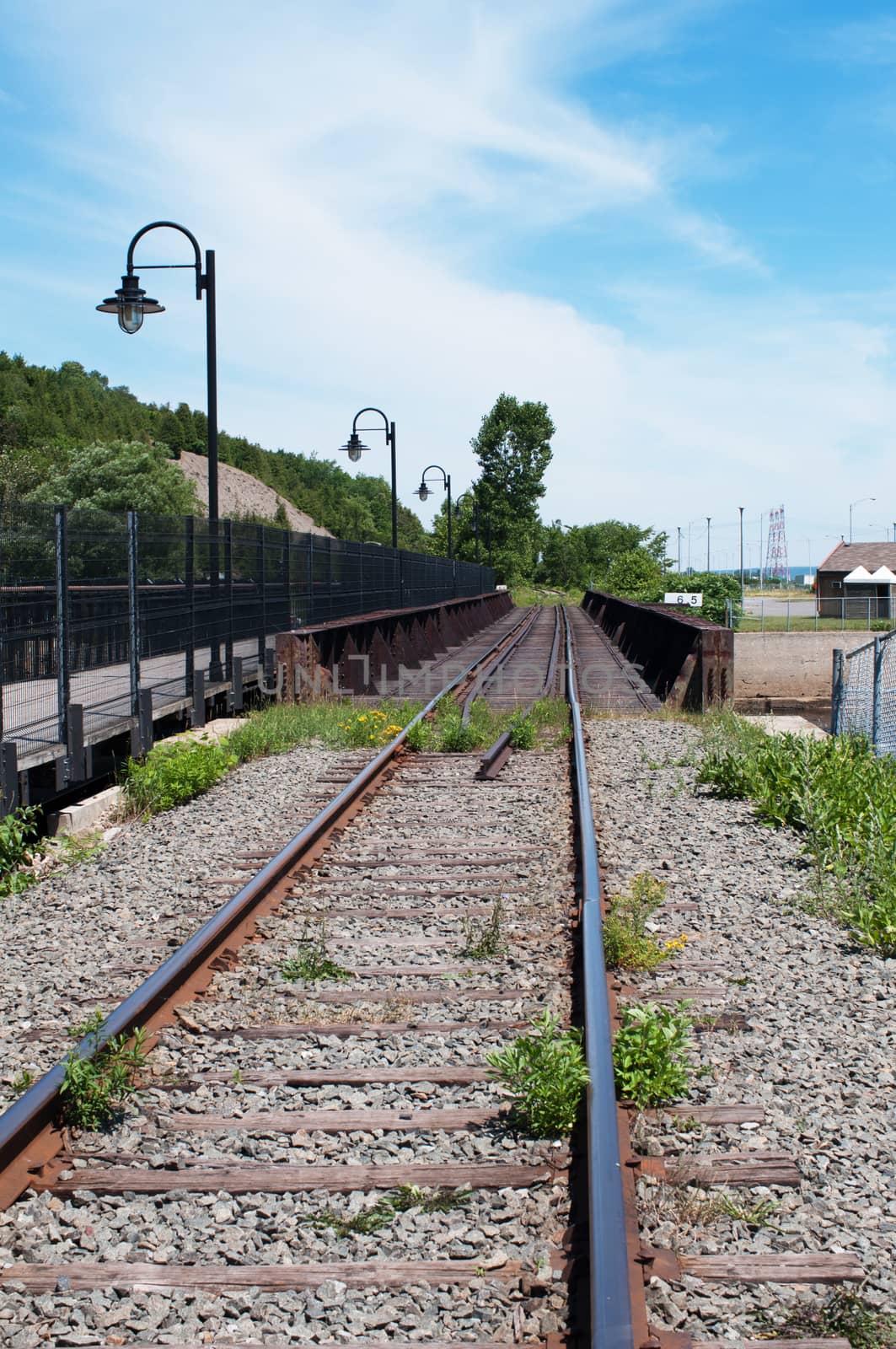 Railway railroad tracks for trains  summer day