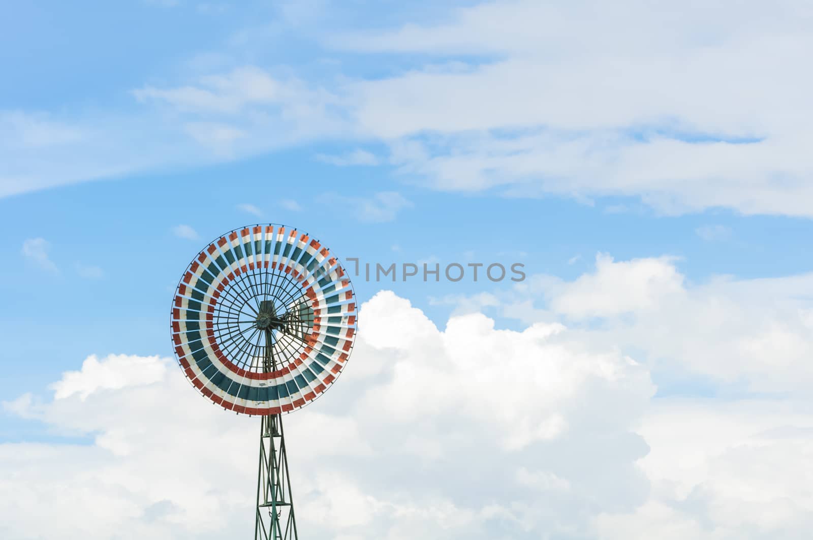 Wind turbine is a circle and the sky.
Thailand