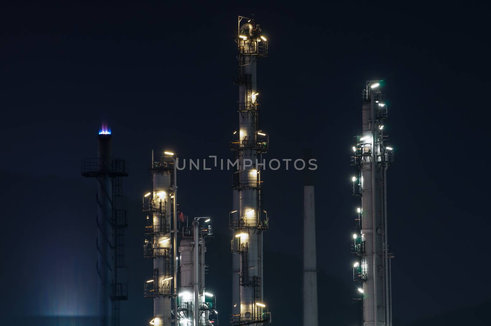 Oil refinery plant at dusk, power station