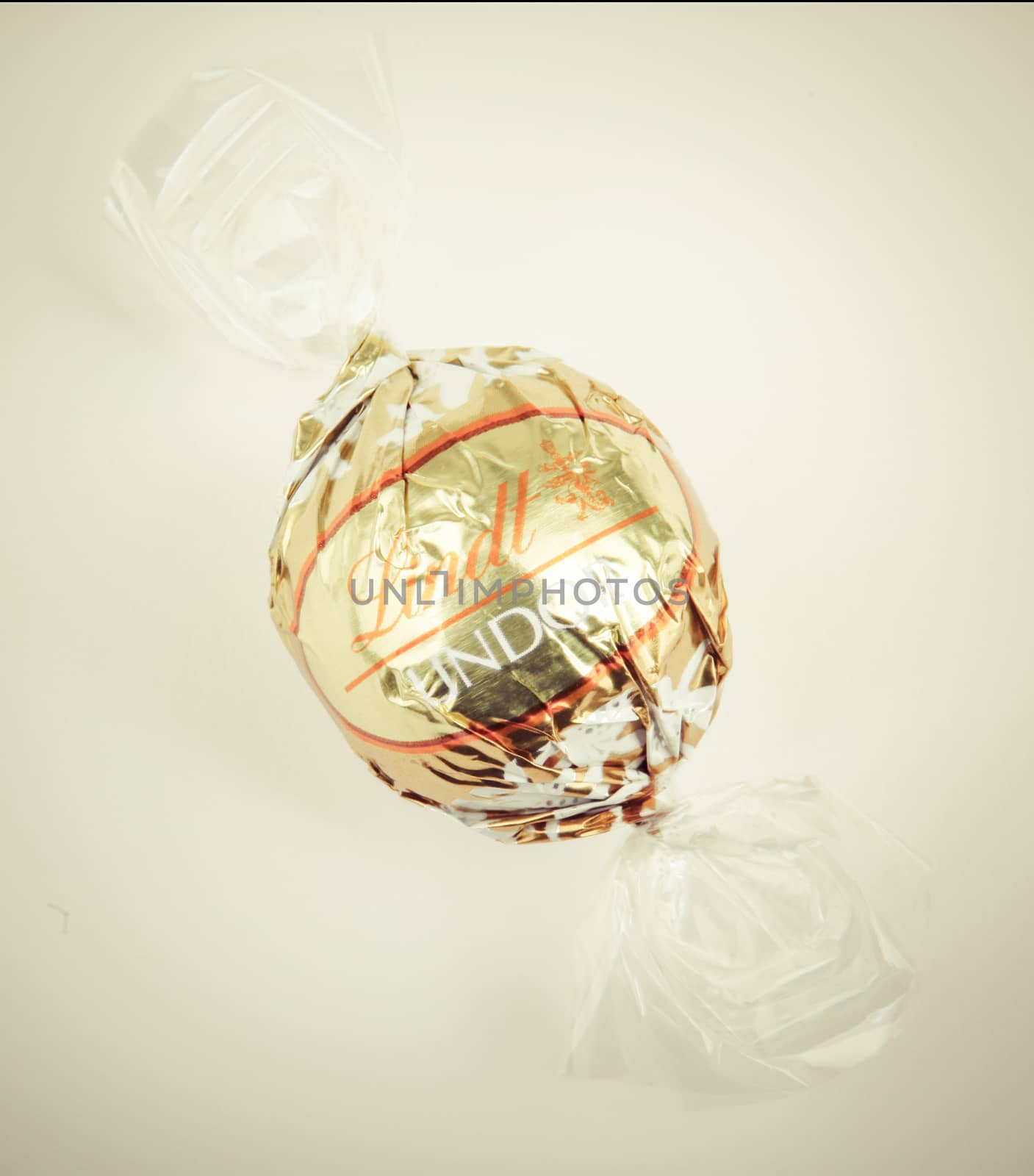 AYTOS, BULGARIA - APRIL 02, 2014: Milk Chocolate LINDOR truffle. Lindt & Spr��ngli is recognized as a leader in the market for premium quality chocolate.