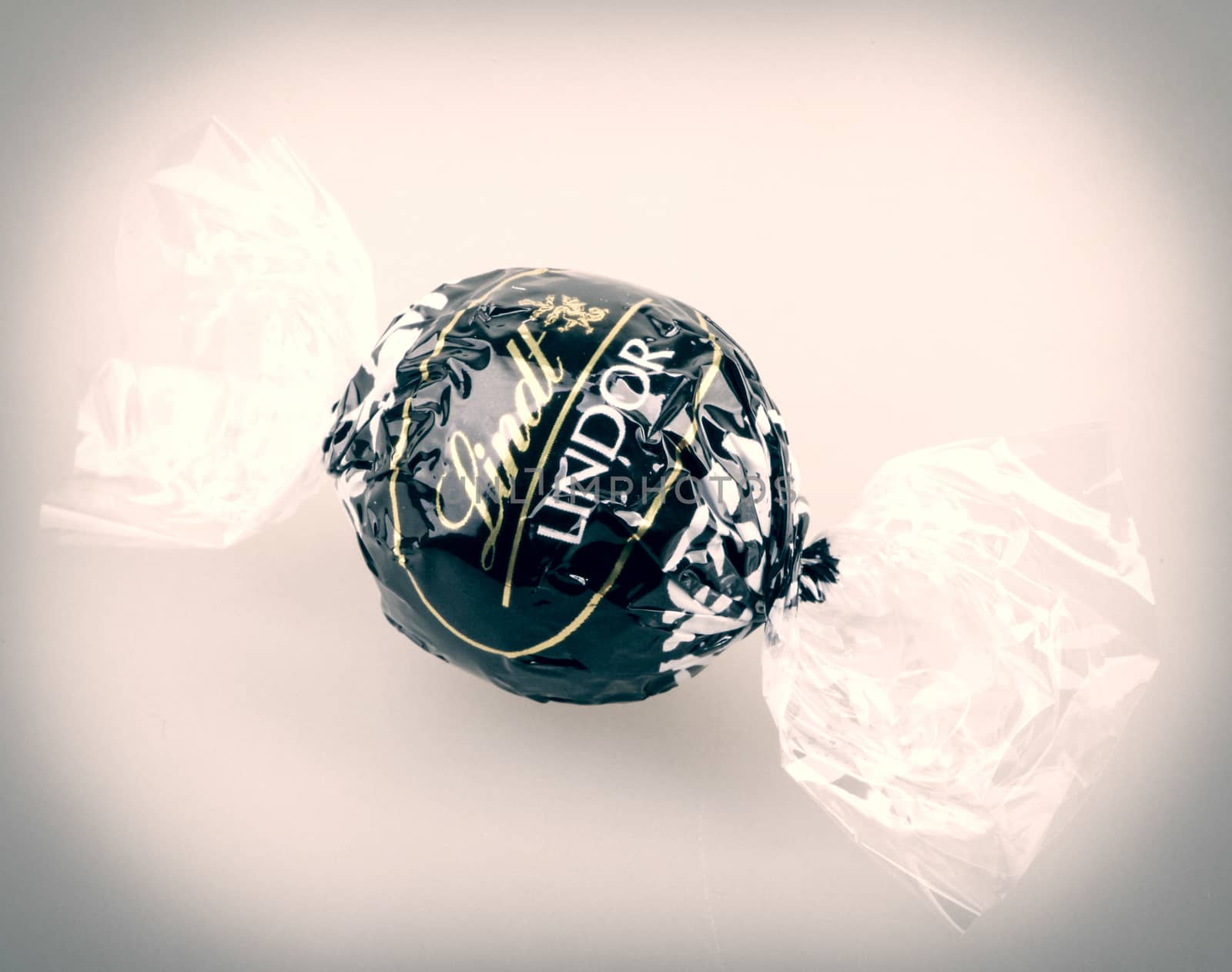 AYTOS, BULGARIA - APRIL 02, 2014: Milk Chocolate LINDOR truffle. Lindt & Spr��ngli is recognized as a leader in the market for premium quality chocolate.