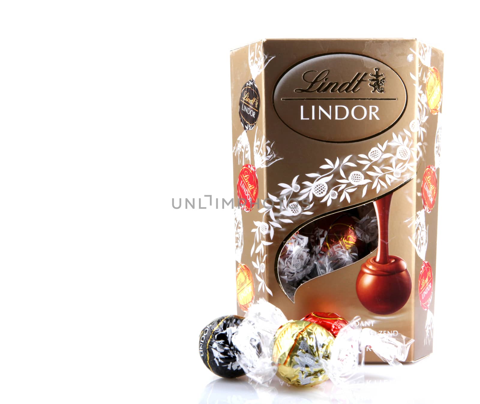 AYTOS, BULGARIA - APRIL 02, 2014: Milk Chocolate LINDOR truffle. Lindt & Spr��ngli is recognized as a leader in the market for premium quality chocolate.