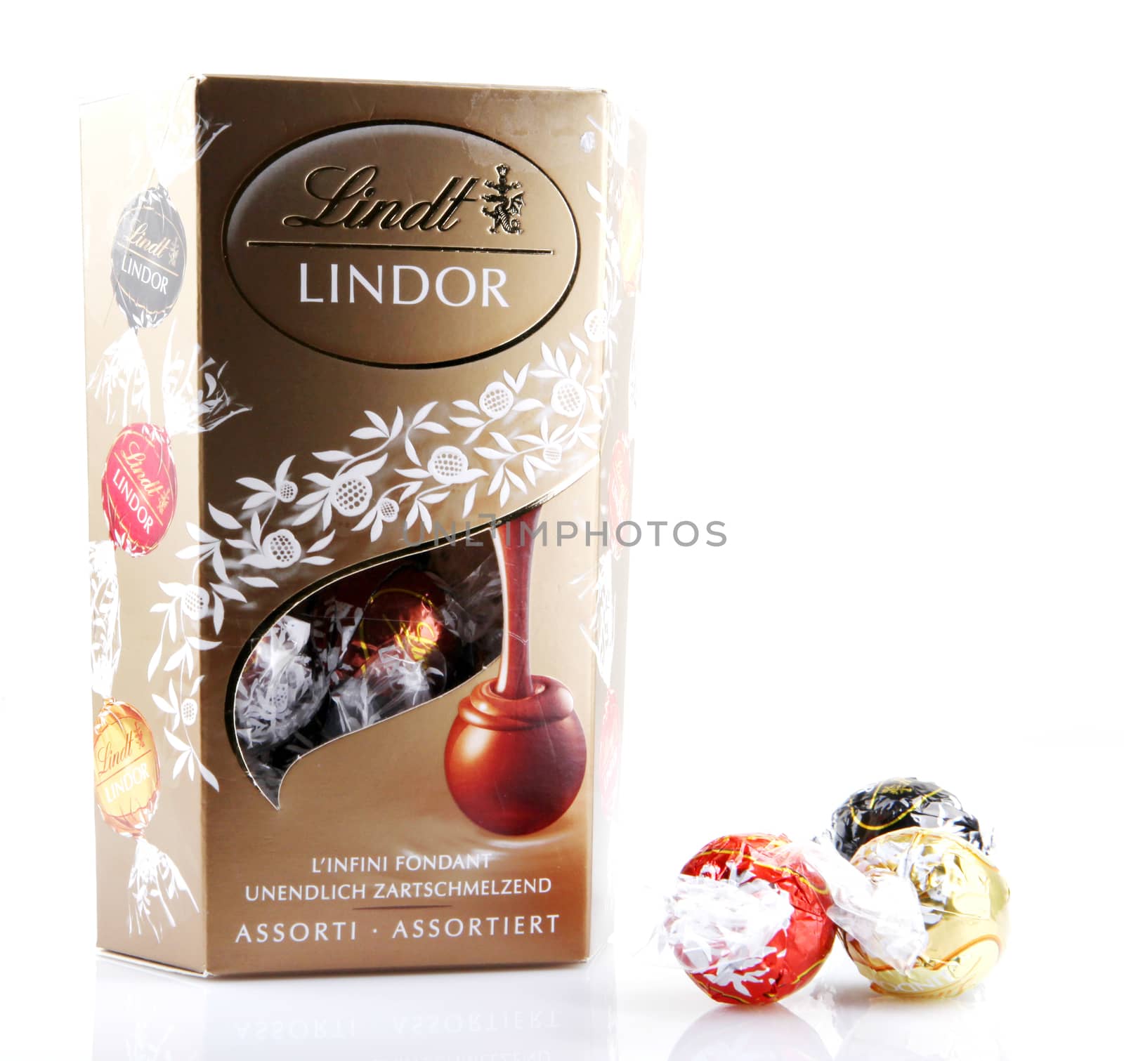 AYTOS, BULGARIA - APRIL 02, 2014: Milk Chocolate LINDOR truffle. Lindt & Spr��ngli is recognized as a leader in the market for premium quality chocolate.