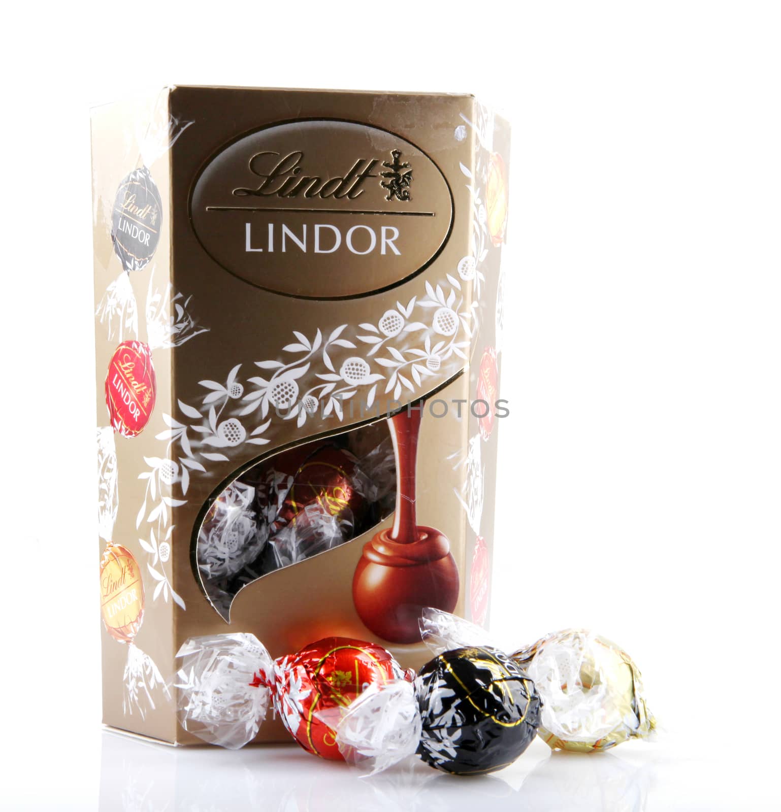 AYTOS, BULGARIA - APRIL 02, 2014: Milk Chocolate LINDOR truffle. Lindt & Spr��ngli is recognized as a leader in the market for premium quality chocolate.
