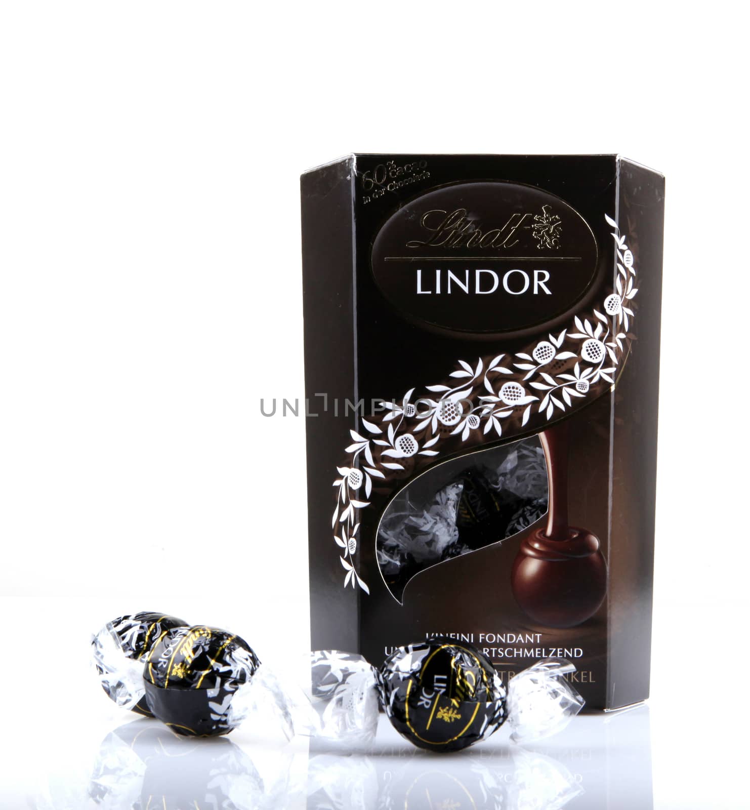 AYTOS, BULGARIA - APRIL 02, 2014: Milk Chocolate LINDOR truffle. Lindt & Spr��ngli is recognized as a leader in the market for premium quality chocolate.