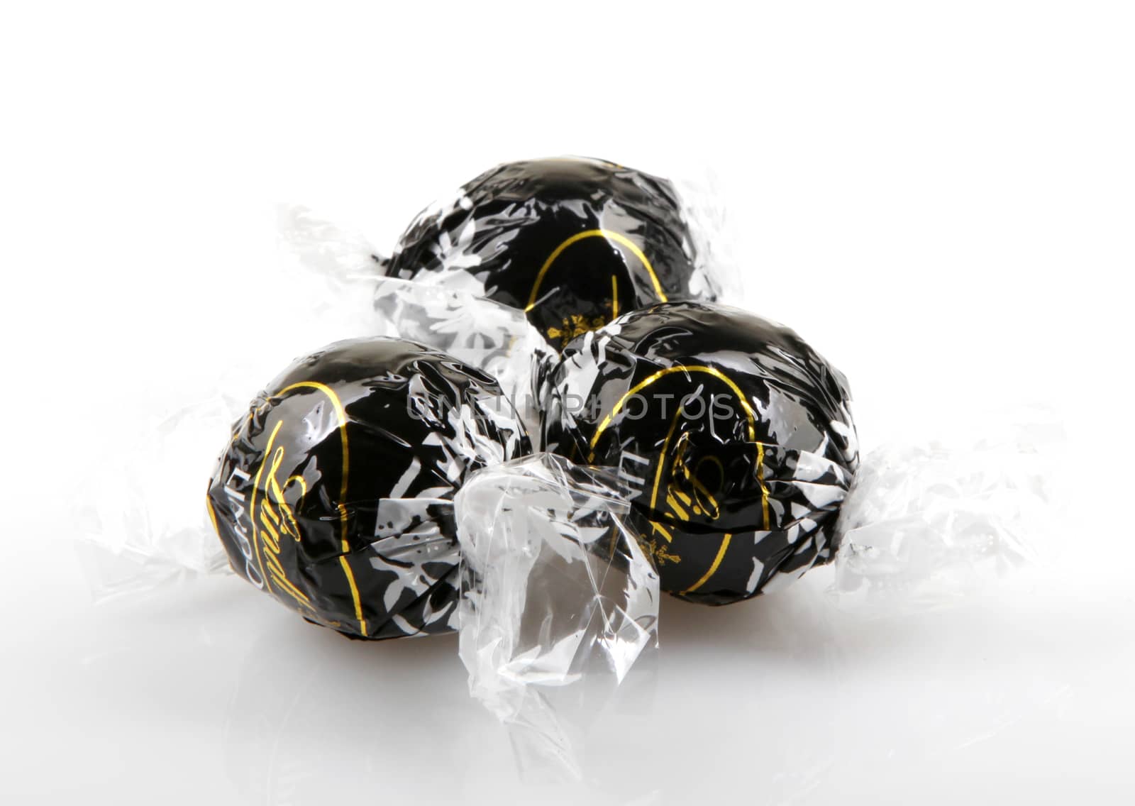 AYTOS, BULGARIA - APRIL 02, 2014: Milk Chocolate LINDOR truffle. Lindt & Spr��ngli is recognized as a leader in the market for premium quality chocolate.