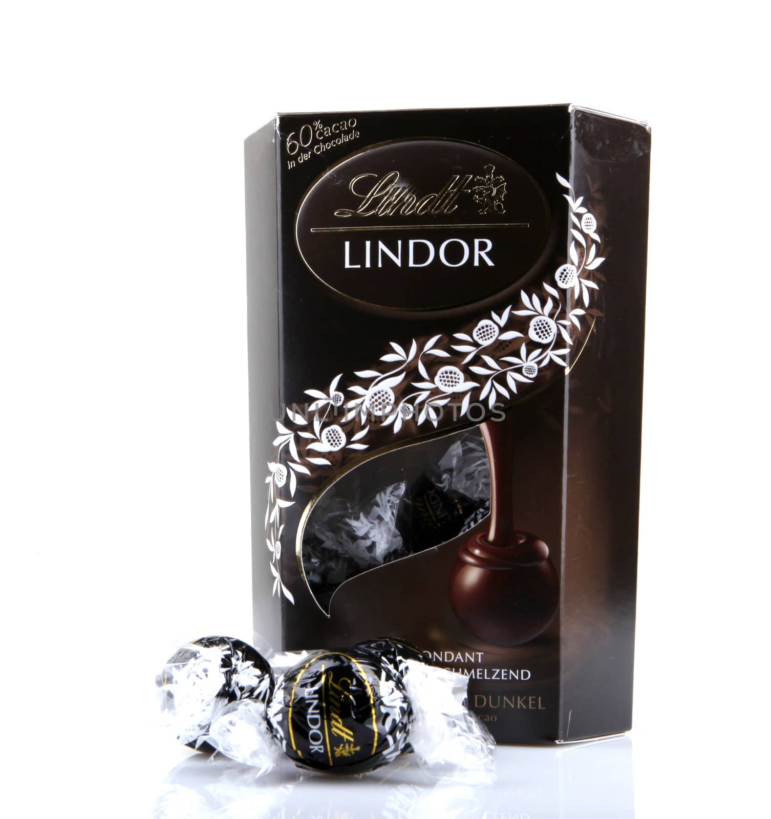 AYTOS, BULGARIA - APRIL 02, 2014: Milk Chocolate LINDOR truffle. Lindt & Spr��ngli is recognized as a leader in the market for premium quality chocolate.