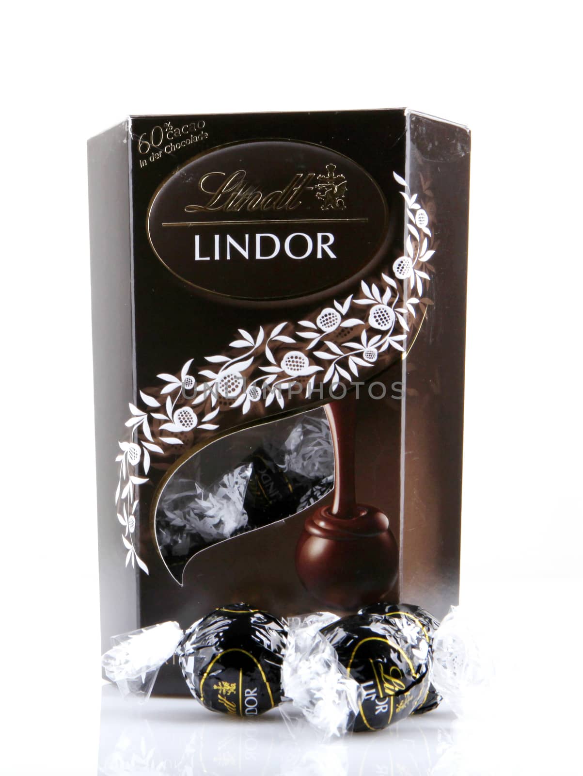 AYTOS, BULGARIA - APRIL 02, 2014: Milk Chocolate LINDOR truffle. Lindt & Spr��ngli is recognized as a leader in the market for premium quality chocolate.