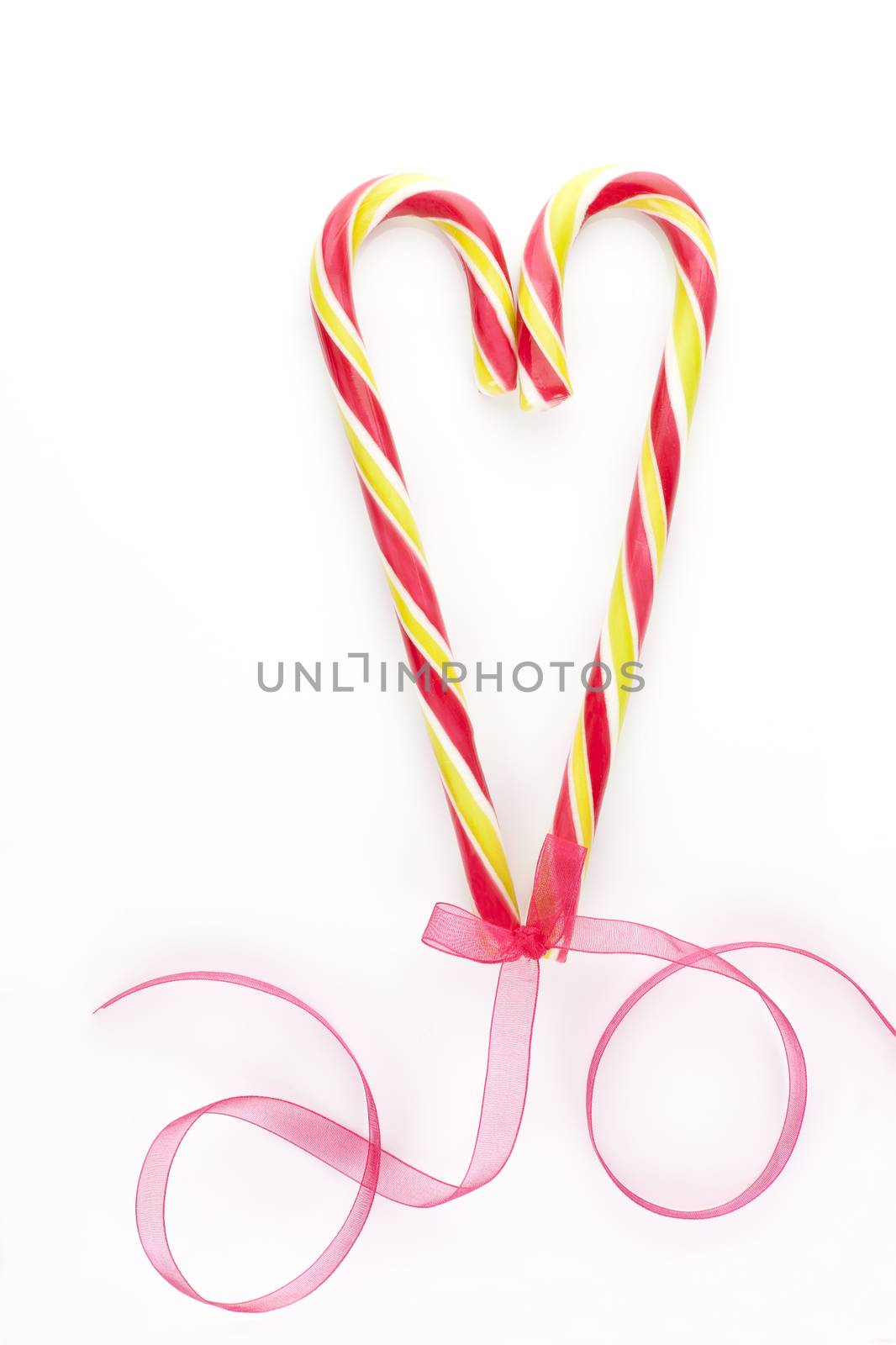 Candy cane heart background. Christmas love. by eskymaks