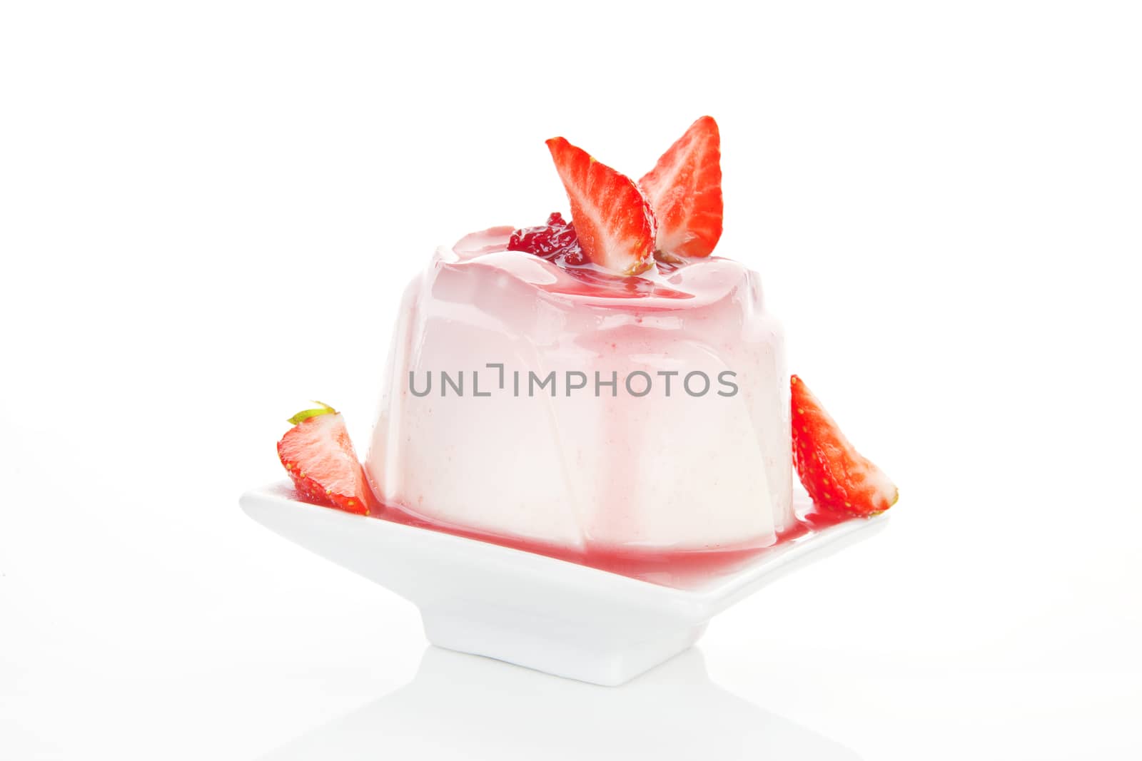 Delicious pudding dessert with fresh strawberries and cream isolated on white background. Culinary sweets concept.