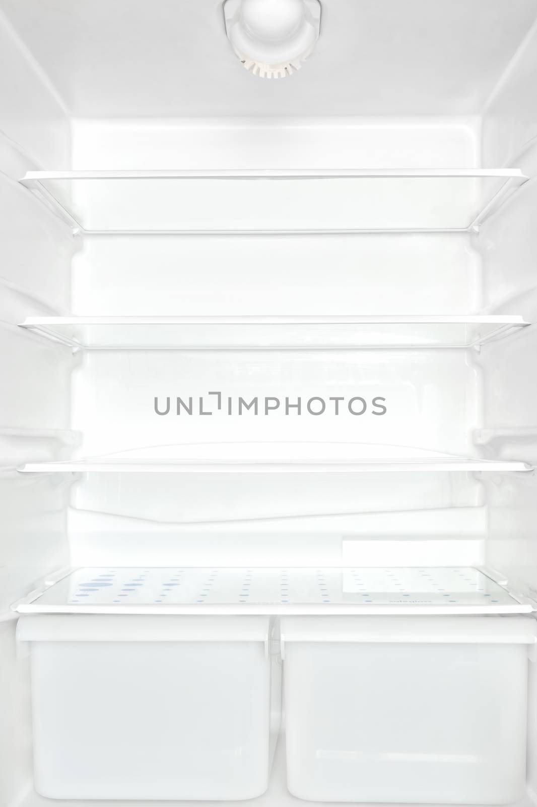 Open empty white refrigerator. Unhealthy eating disorder concept.