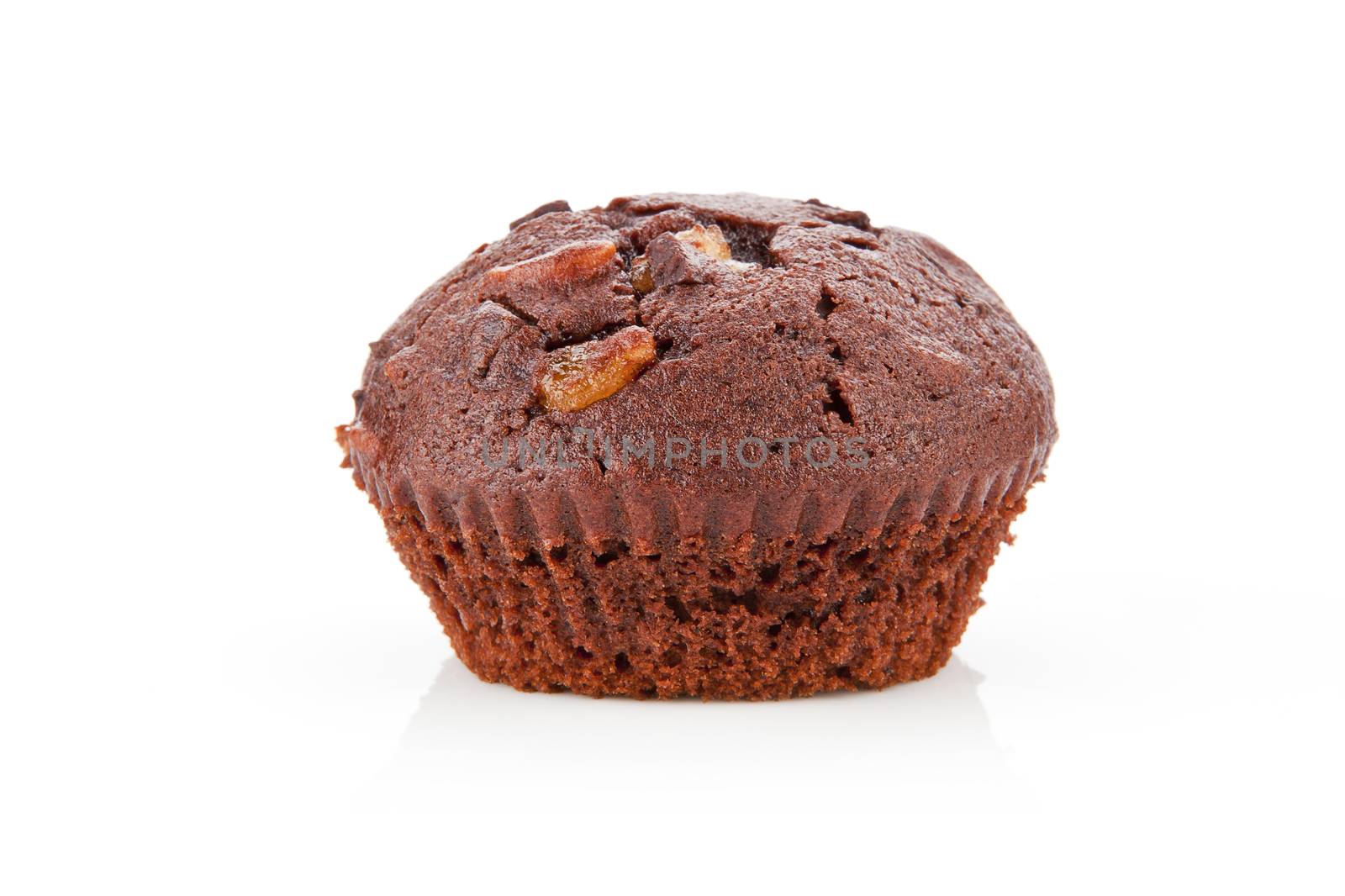 Delicious homemade chocolate muffin isolated on white background.