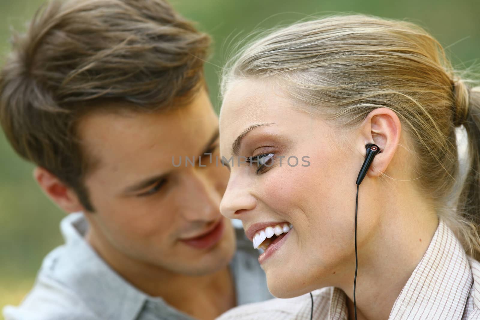 beautiful couple listening player  by toocan