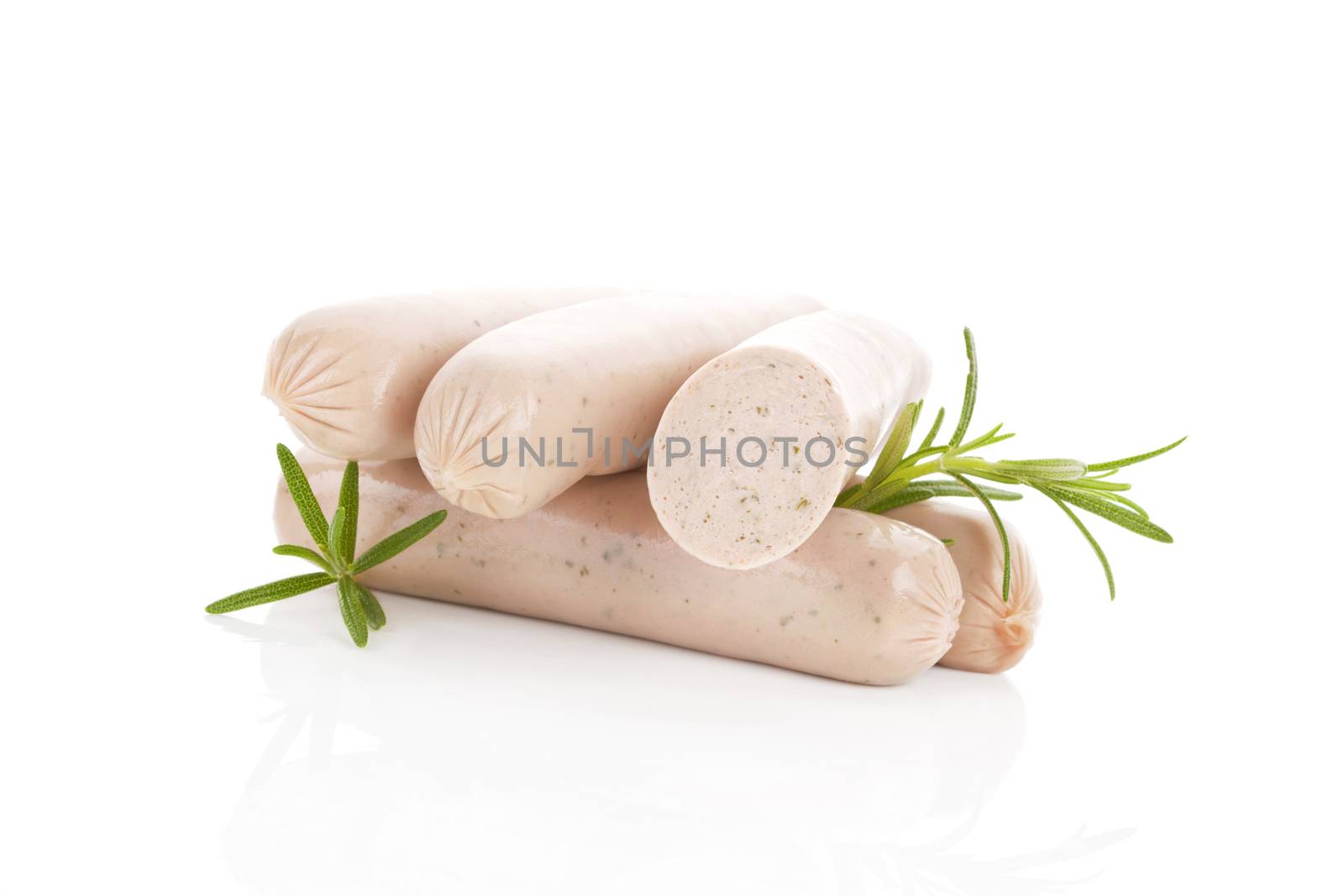 Several german traditional bratwurst sausages isolated on white background.