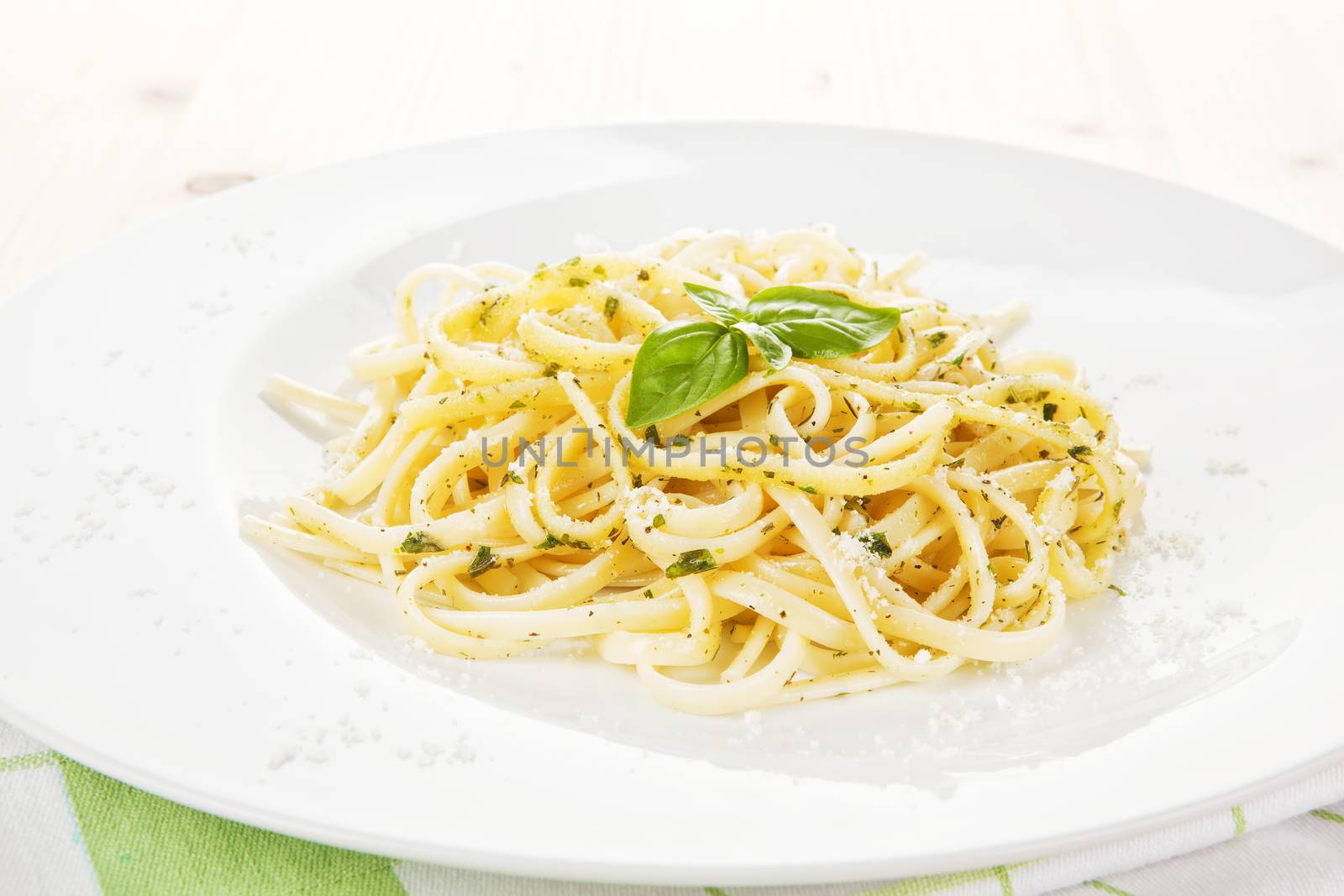 Delicious spaghetti on white plate. Traditional italian pasta.