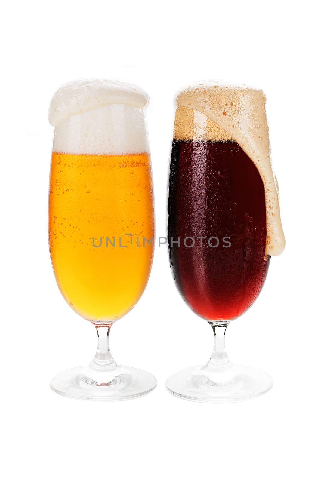 Lager and dark cold beer in glasses isolated on white background. 