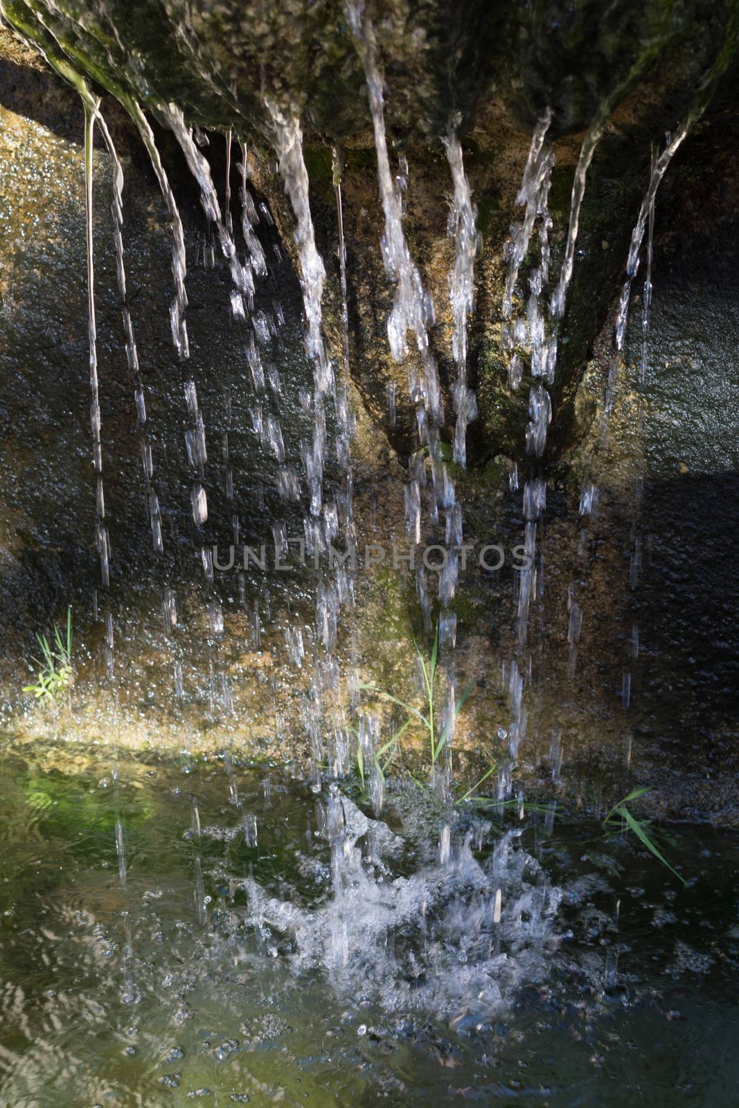 Water fountain with falling water.