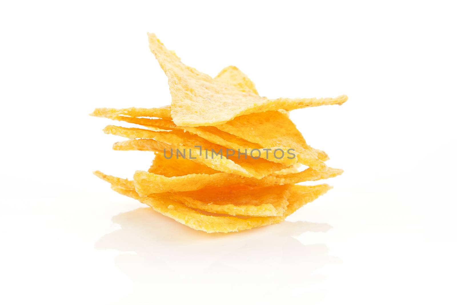 Nachos pile isolated on white background. Mexican food. 