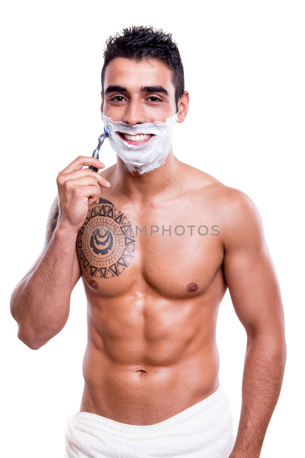 Man shaving his face over white background