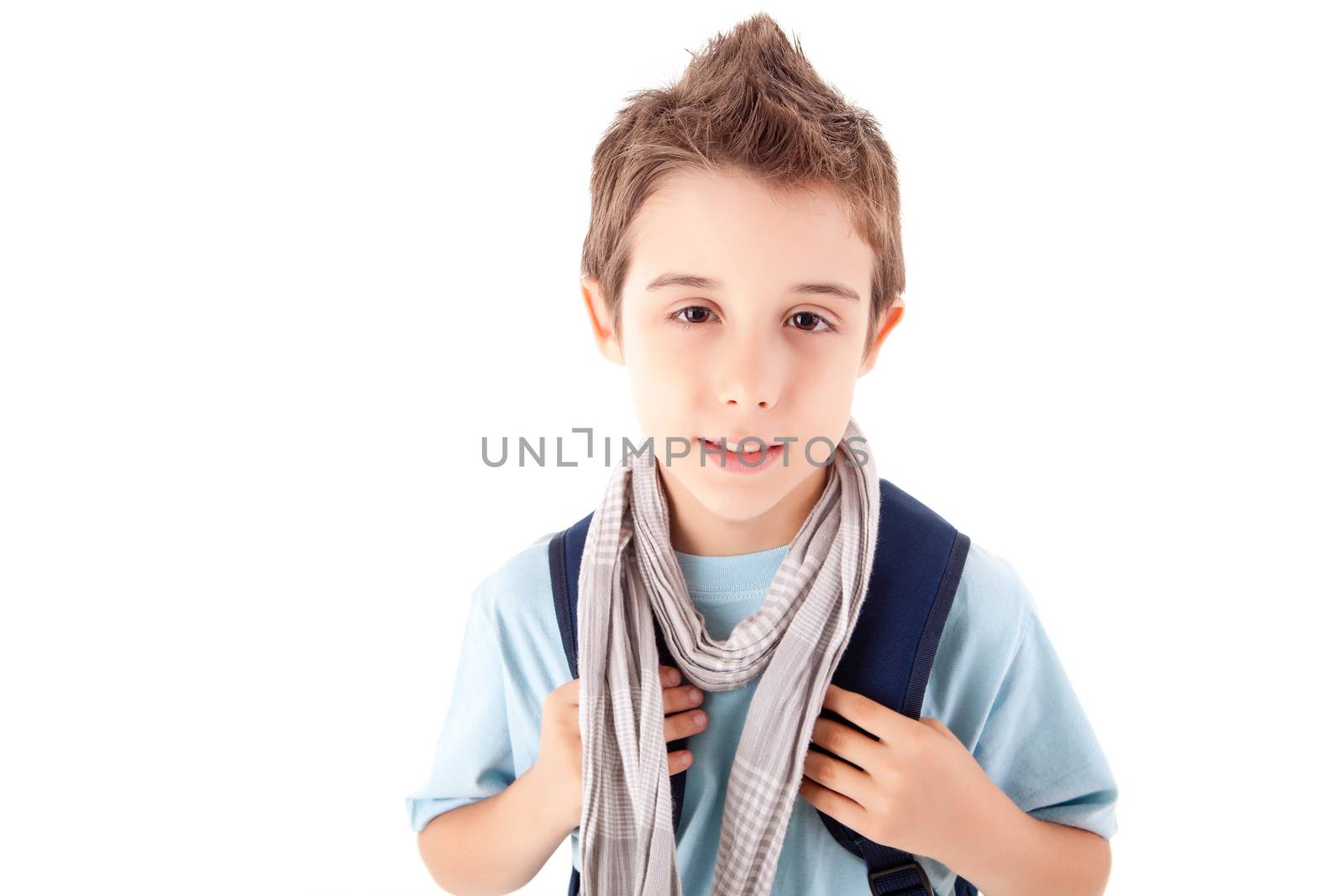 Portrait of a little boy at school over white background