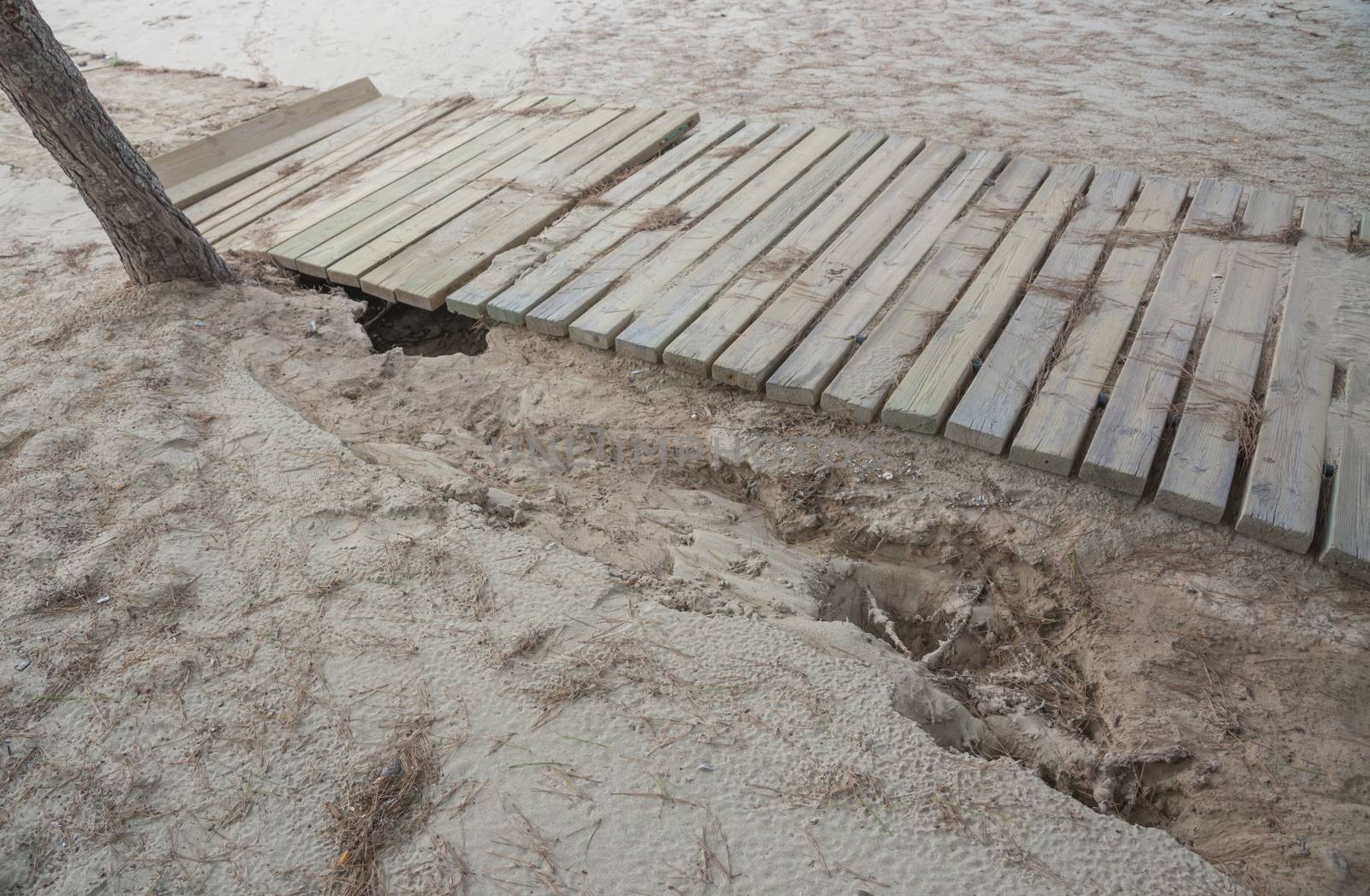 Damaged boardwalk after storm. by ArtesiaWells