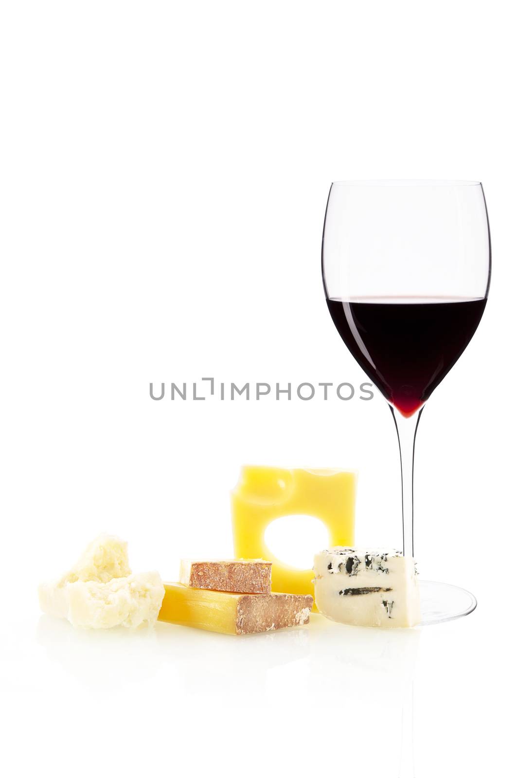 Cheese variation and glass of red wine isolated on white background.