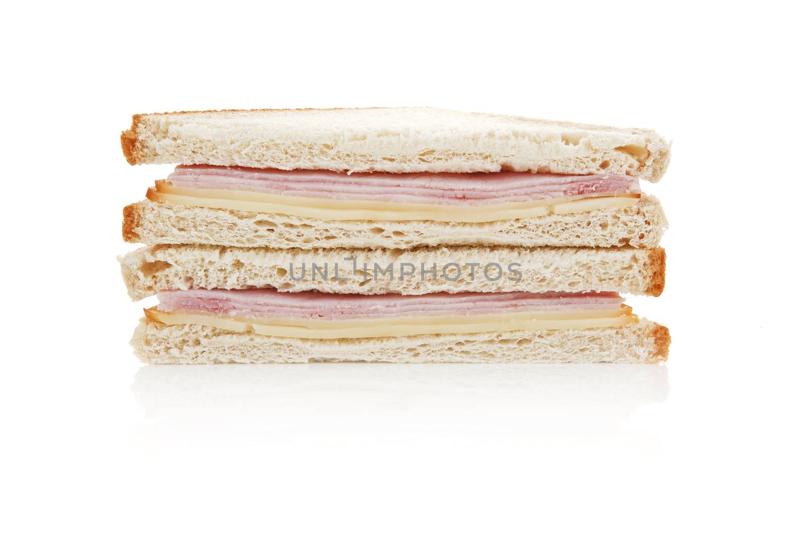 Toast sandwich with ham and cheese isolated on white background.