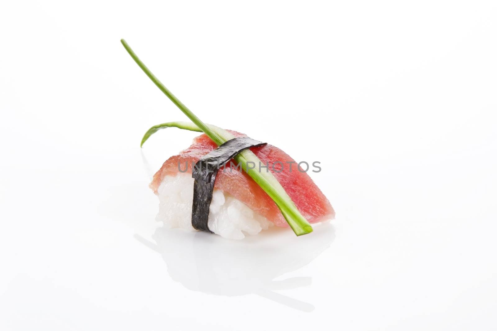 Sashimi tuna sushi piece with chive isolated on white background.