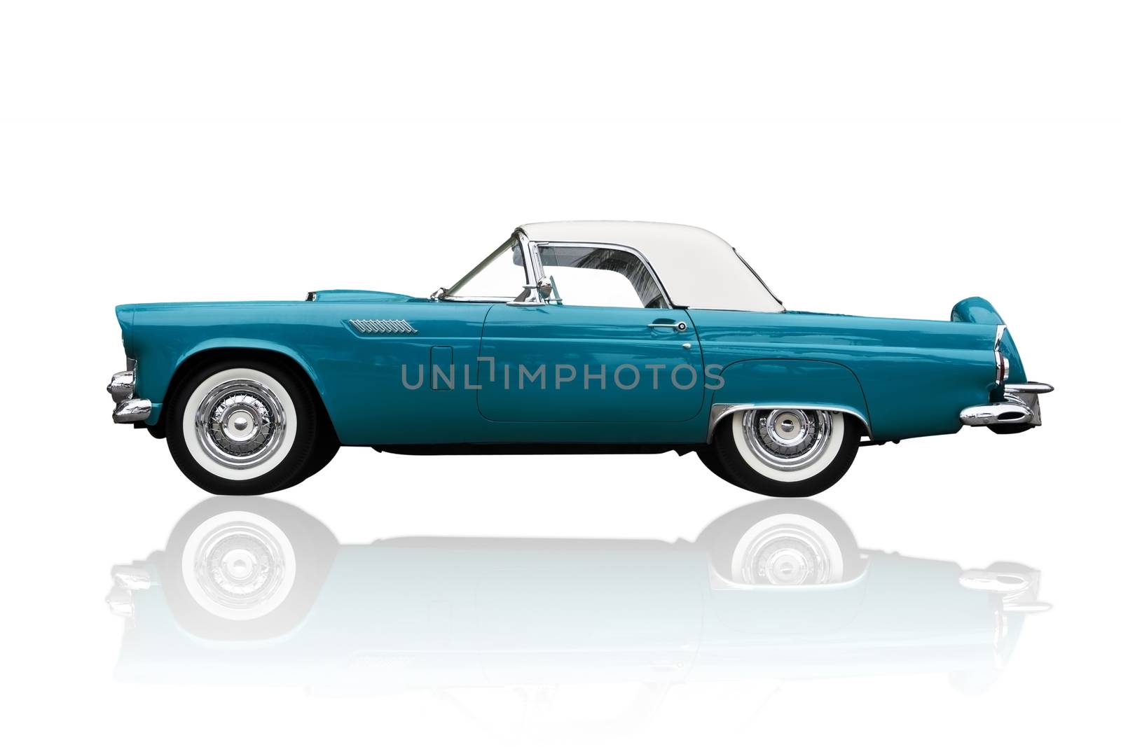 Old shiny car isolated on white. by eskymaks