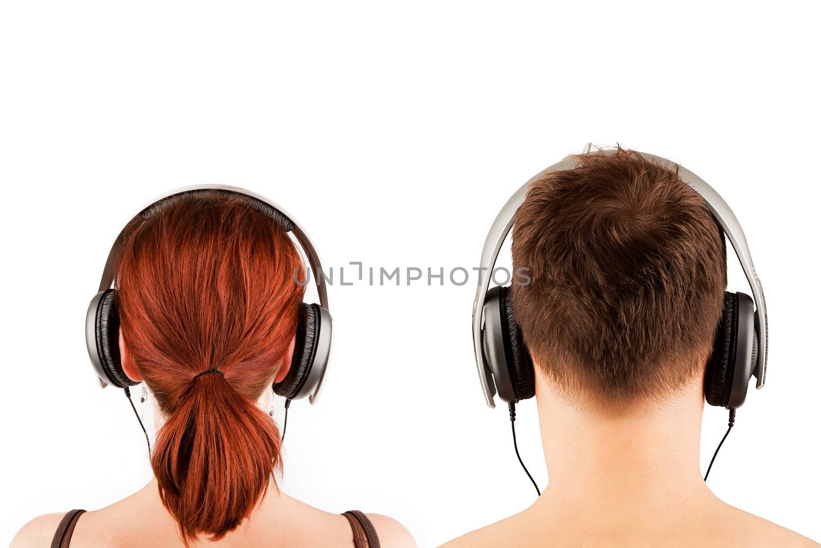 Couple with headphones isolated on white. Back view.