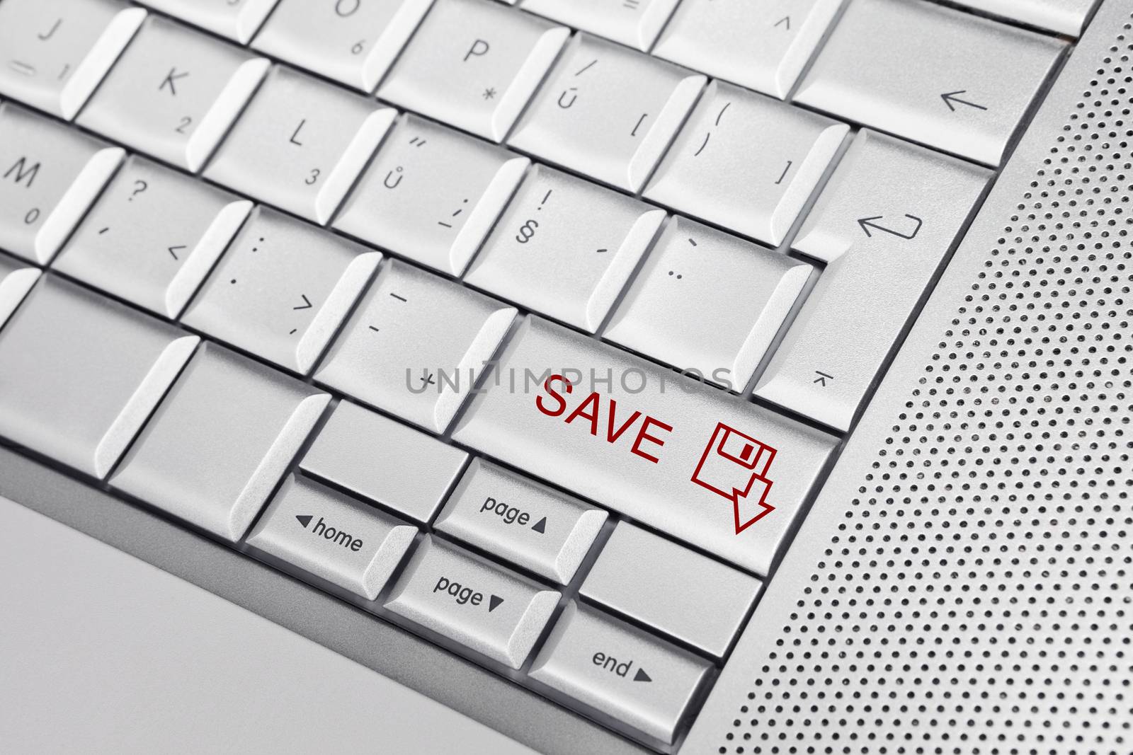 Silver keyboard with SAVE icon and SAVE text on keys. Don't forget to save your work.