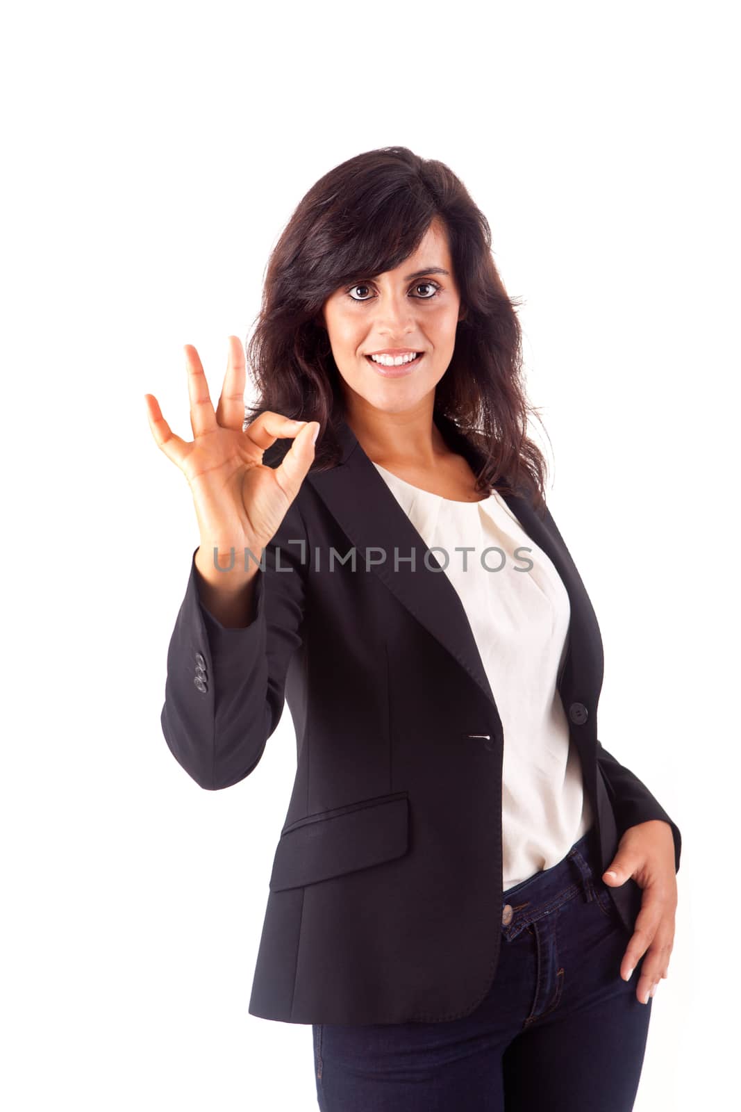 Smiling woman doing the OK sign over white background