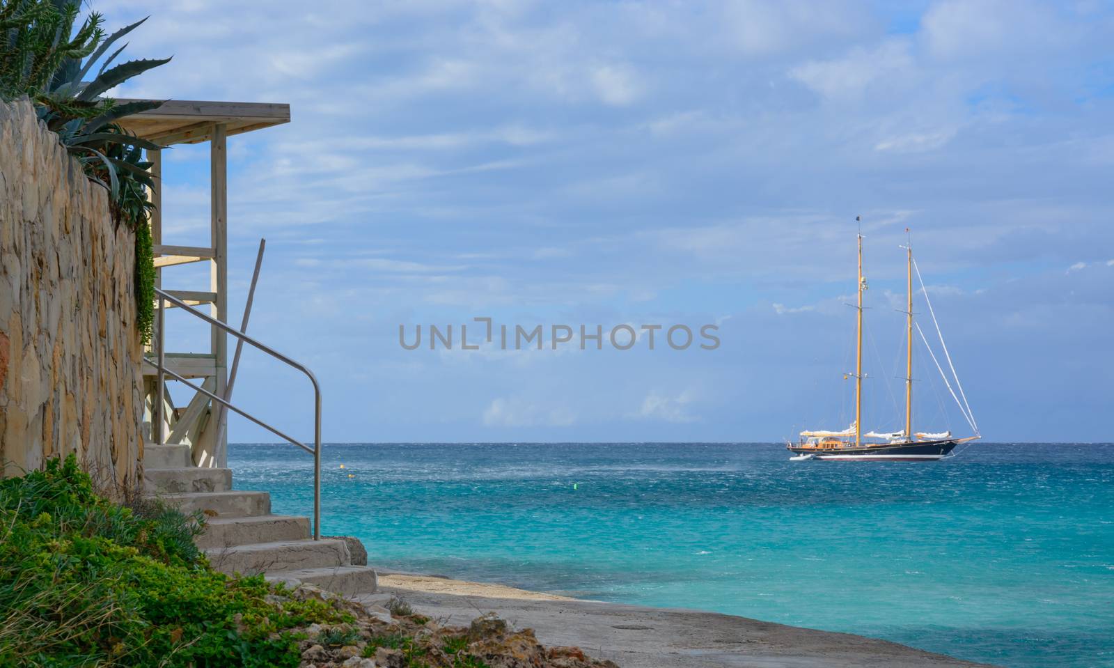 Sailboat on azure seas, Sant Elm, Majorca.