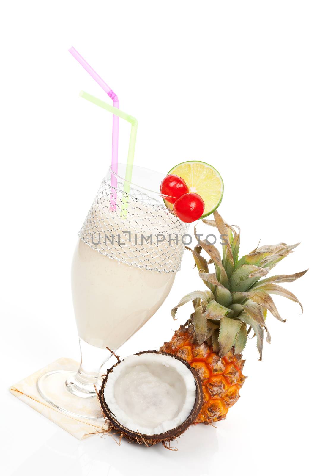 Delicious cocktail pina colada with coconut and pineapple isolated on white background. Cool summer drinks.