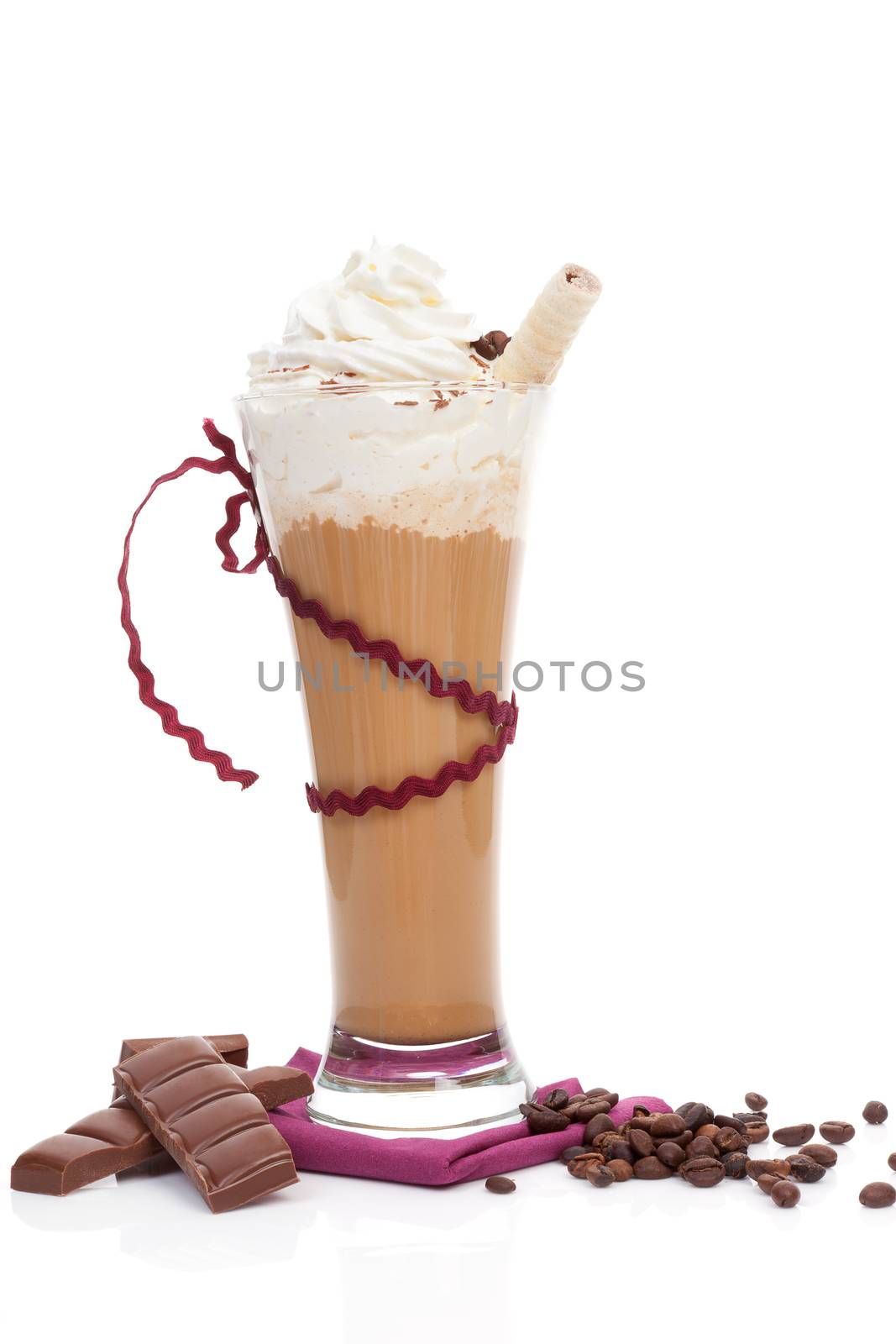 Delicious refreshing ice coffee with cream, rolled wafers, coffee beans and chocolate isolated on white background.