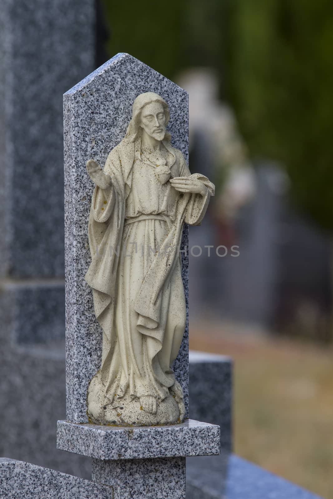 Cemetery detail with stone sculpture by FernandoCortes