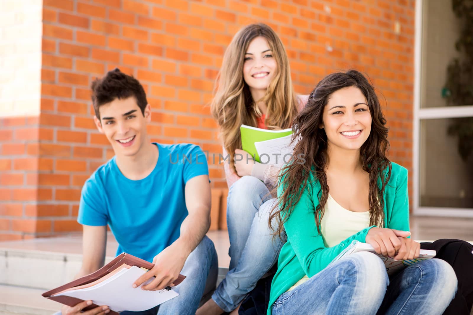 Young group of students in campus by jolopes