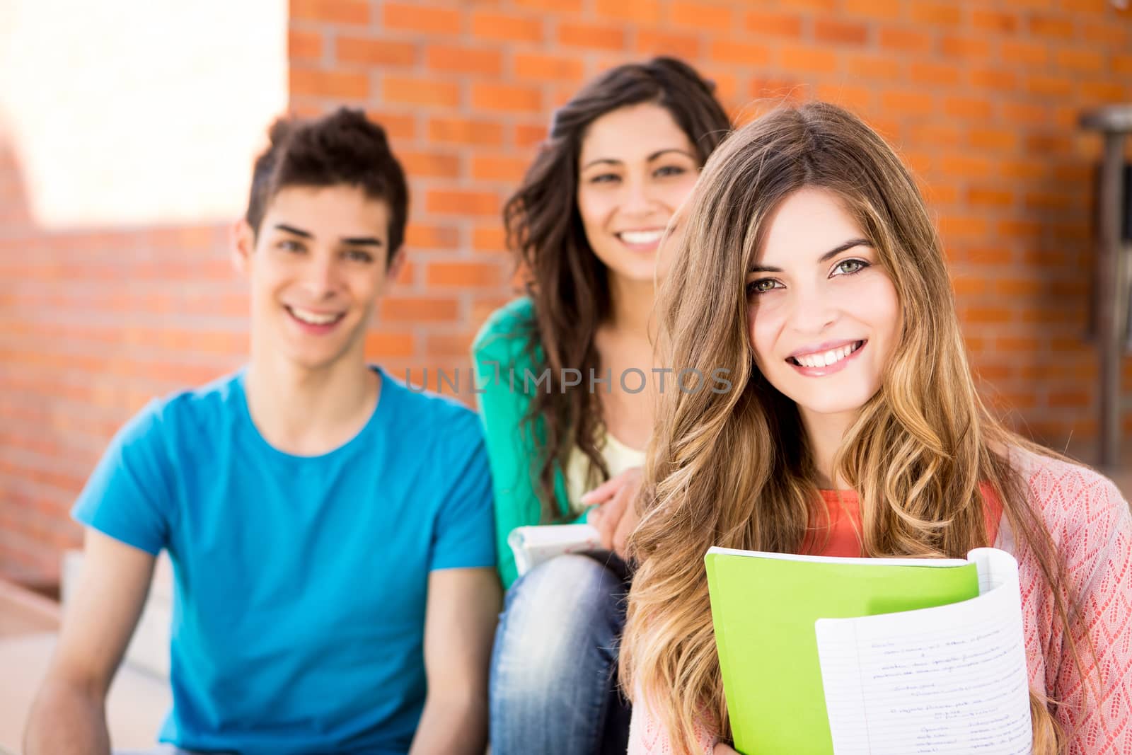 Young group of students in campus by jolopes