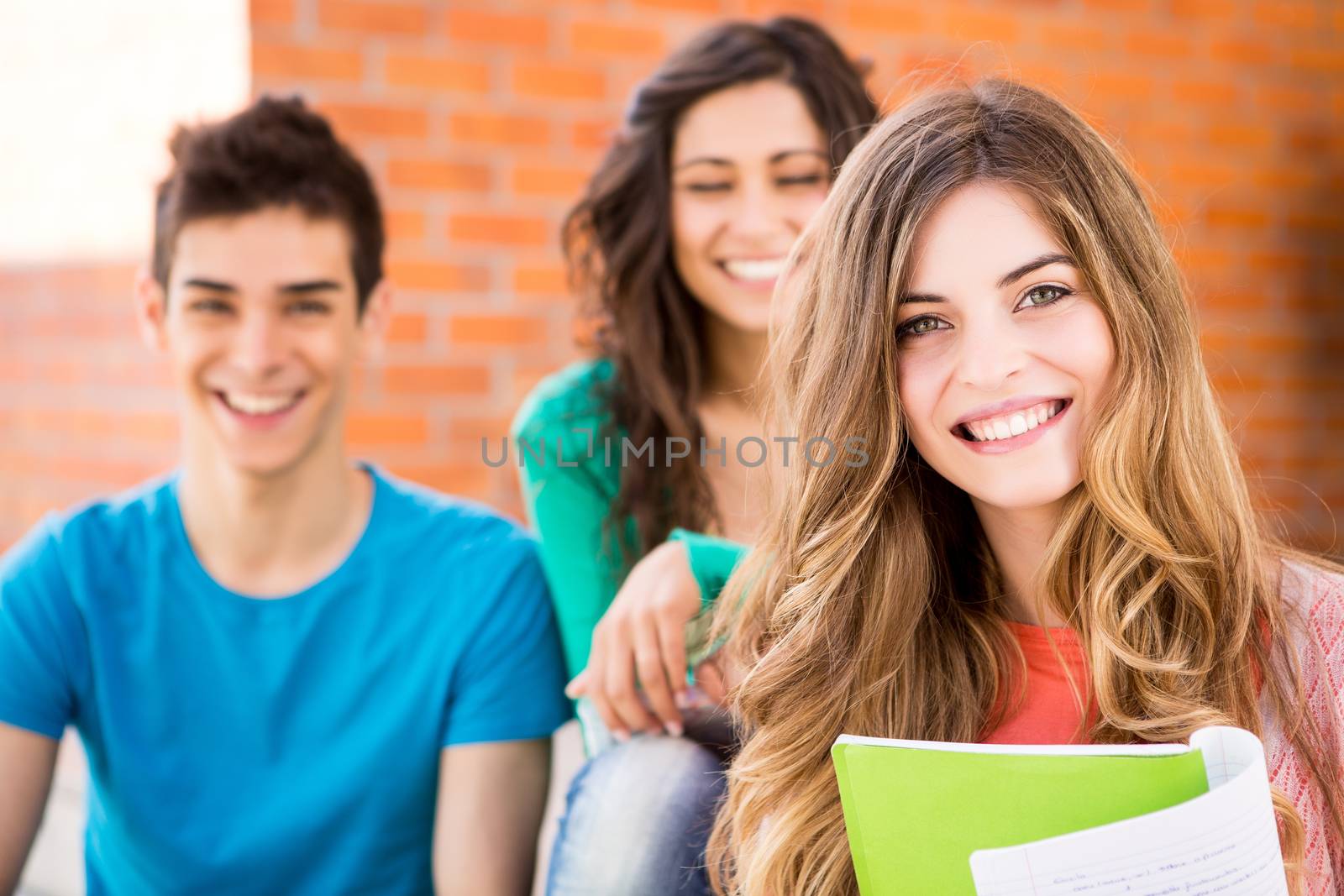 Young group of students in campus by jolopes