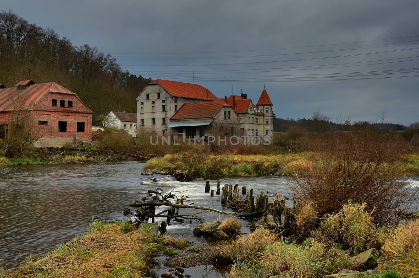 An old house near by river by richpav