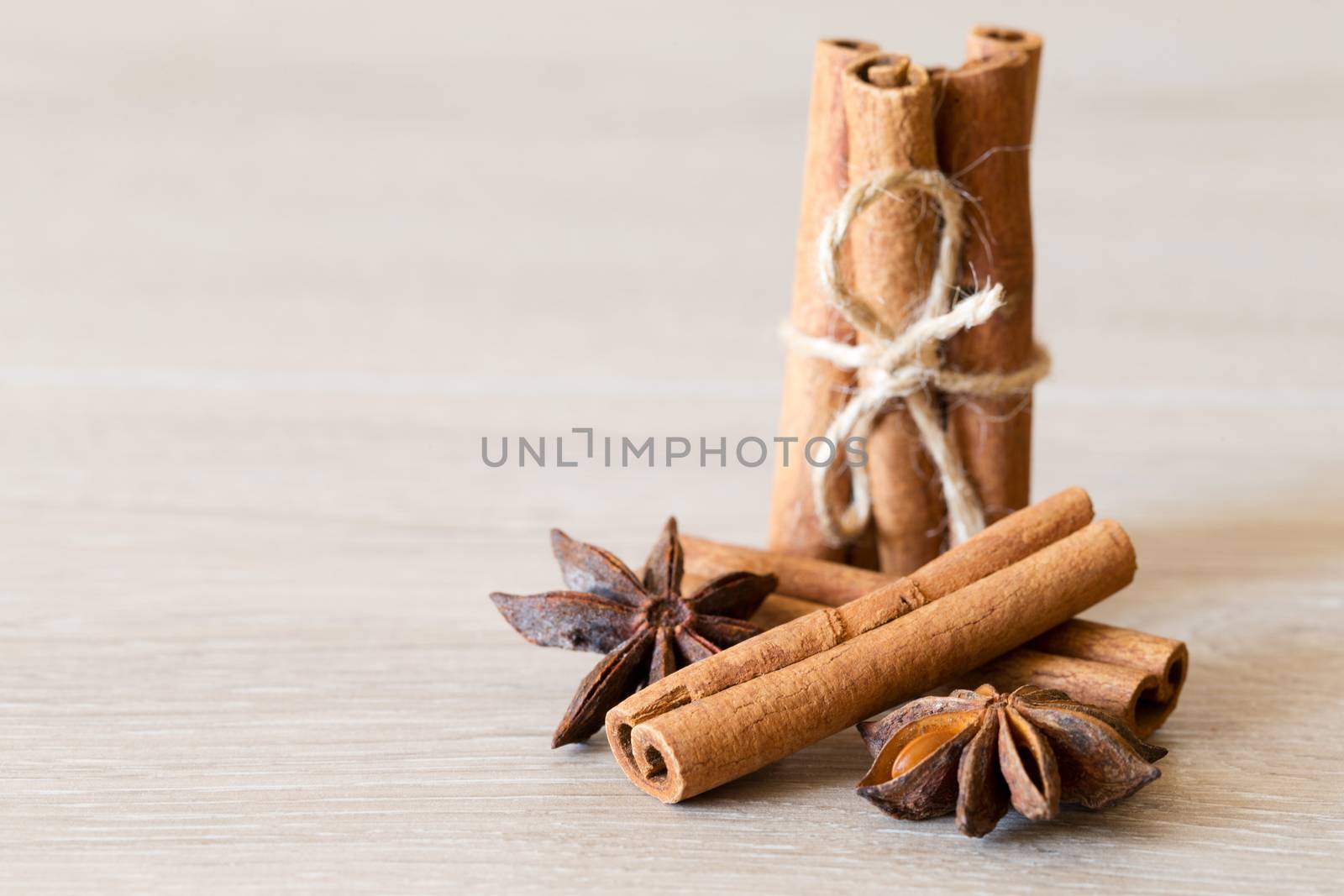 anise and cinnamon, on wooden table

