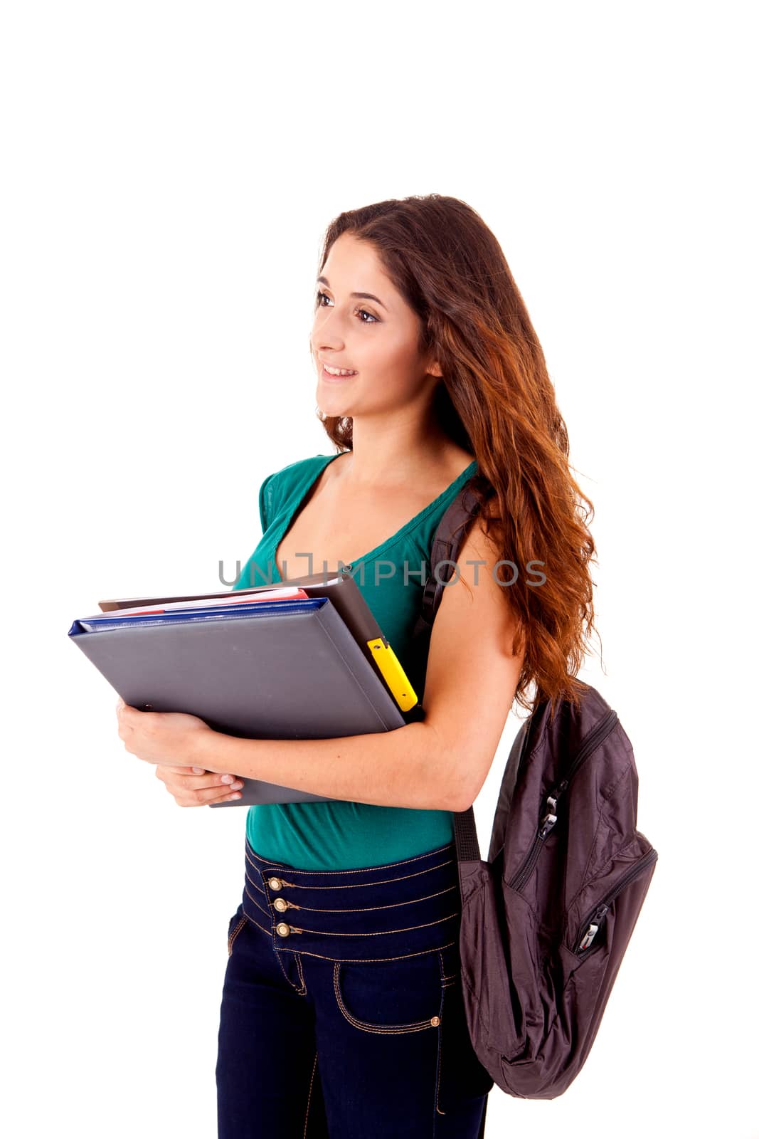 University girl holding books and smiling over white background