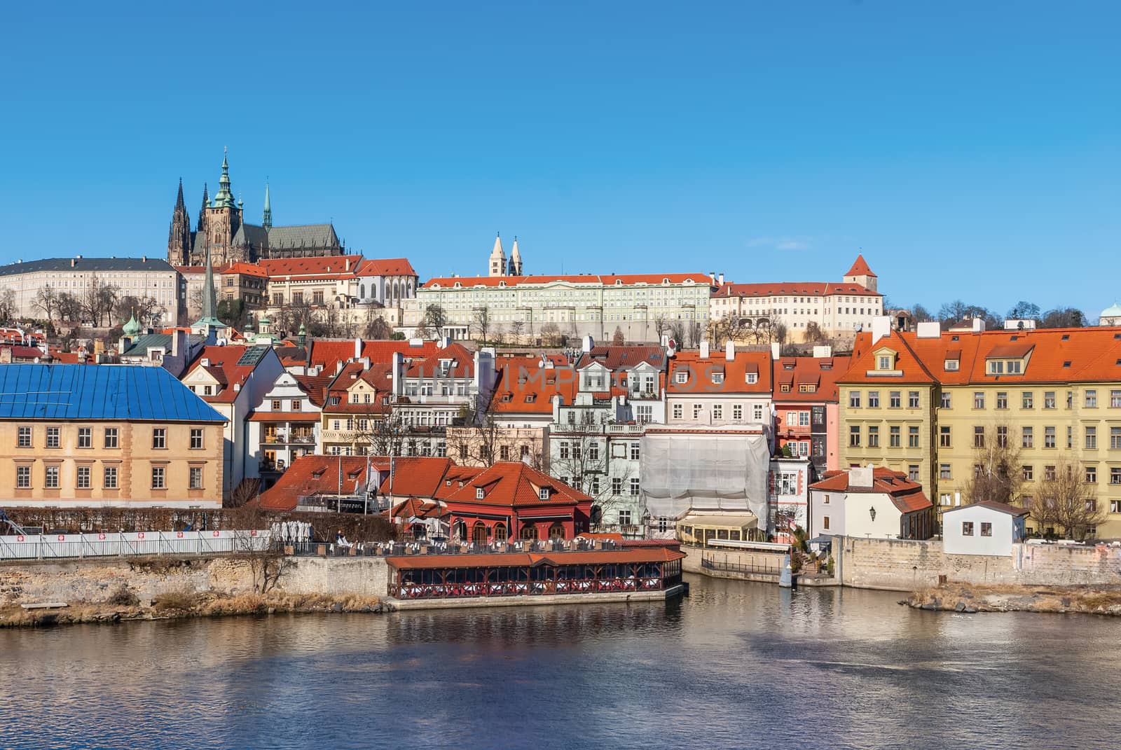 View of colorful old town and Prague castle with river Vltava, Czech Republic