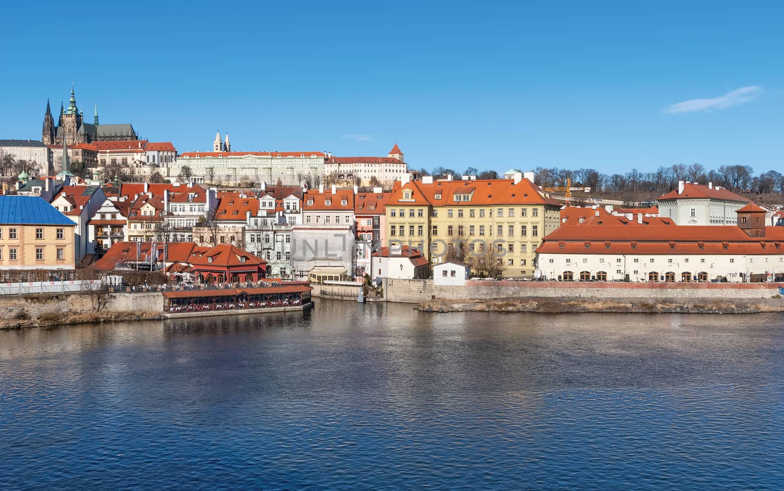 View of colorful old town and Prague castle with river Vltava, Czech Republic