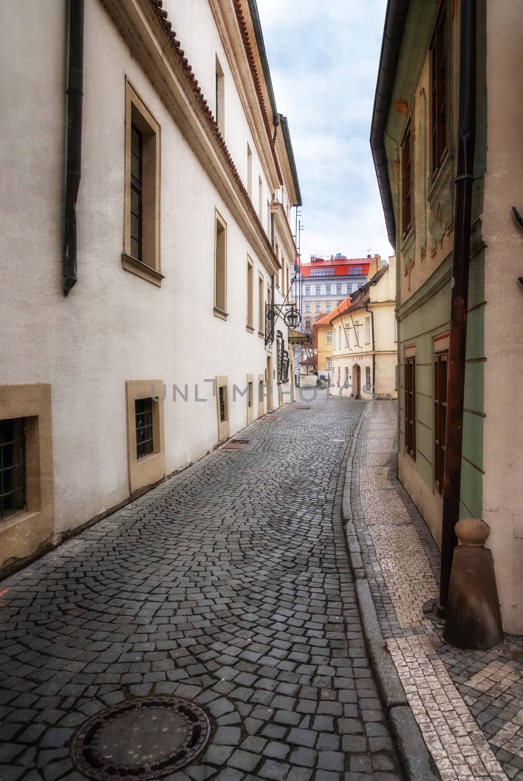 Morning in old city without people . Prague. textured old paper background by Zhukow