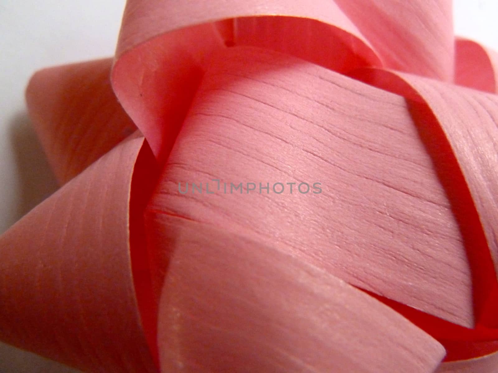 Bright stripped pink ribbon as a background