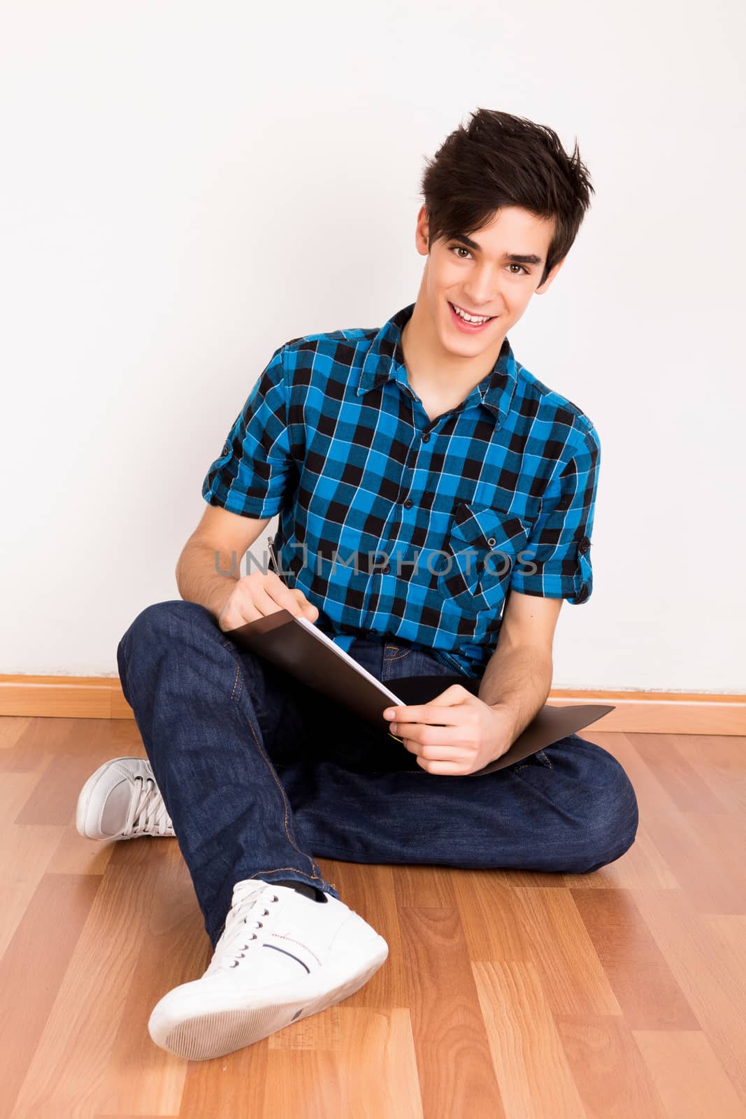 Young man studying at home