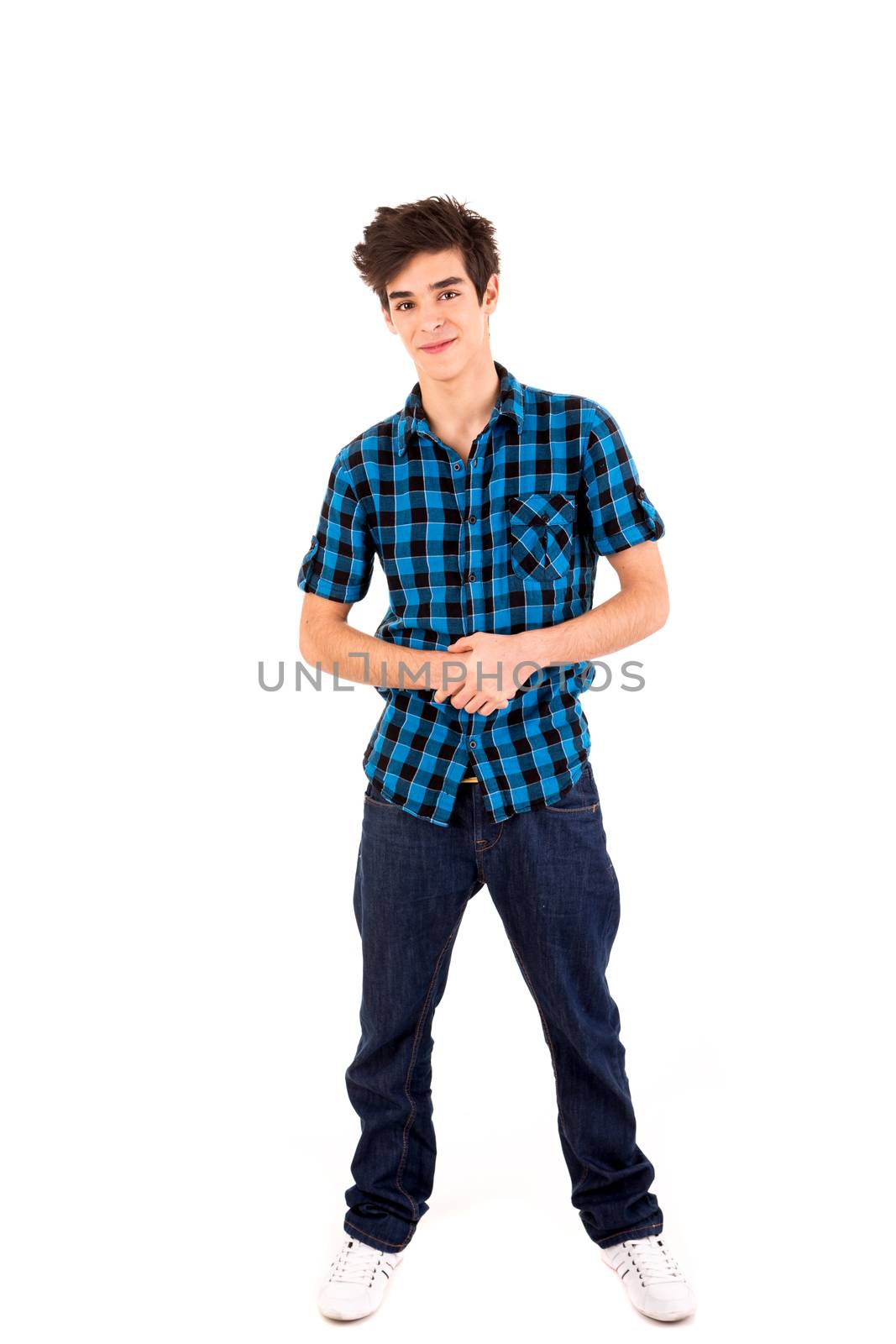 Studio picture of a young and handsome man posing