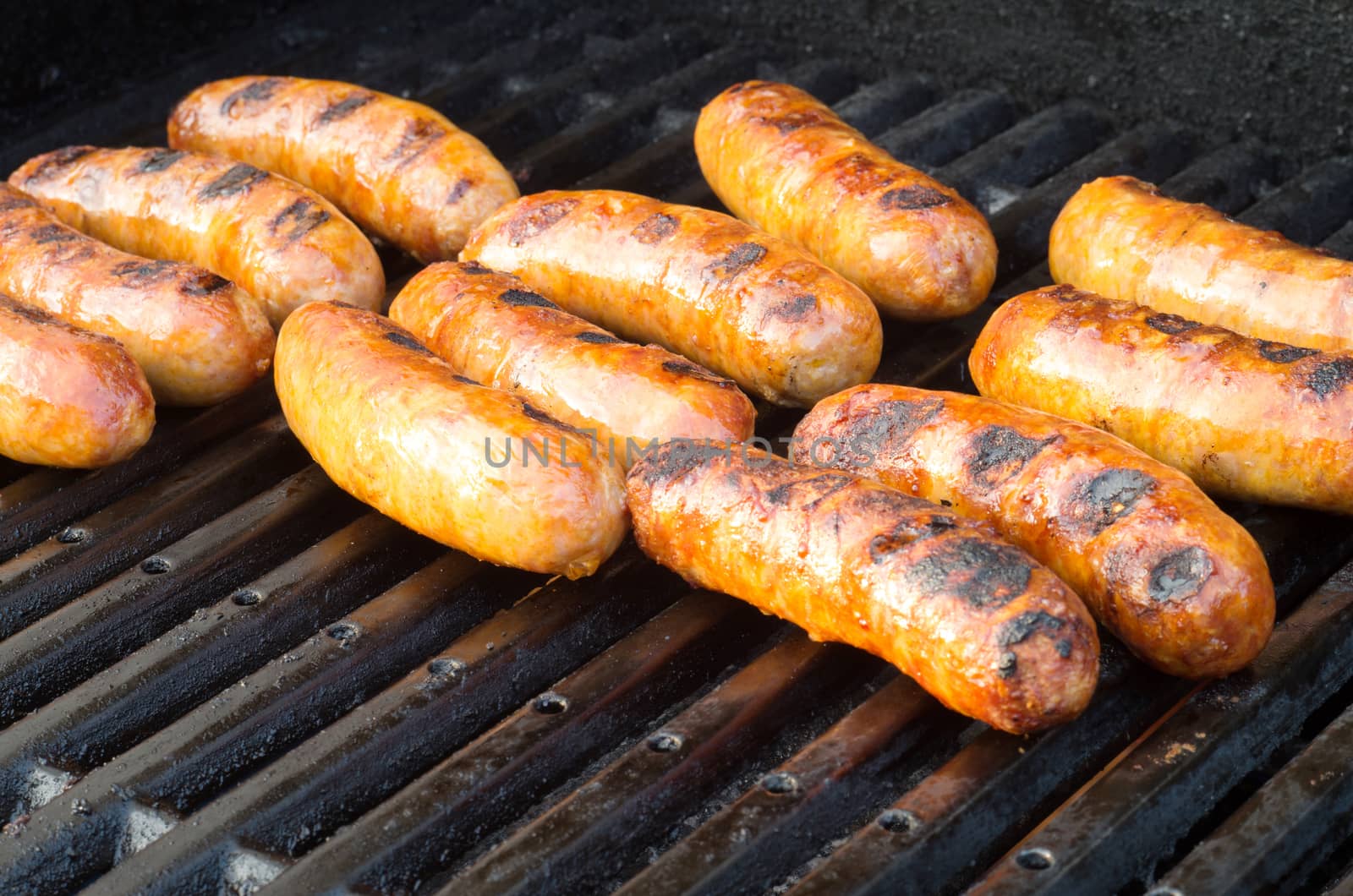 Italian sausages on grill outdoor barbeque