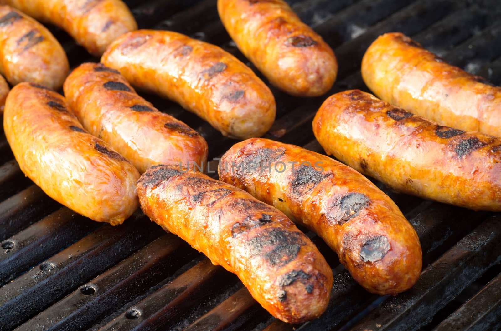 Italian sausages on grill outdoor barbeque